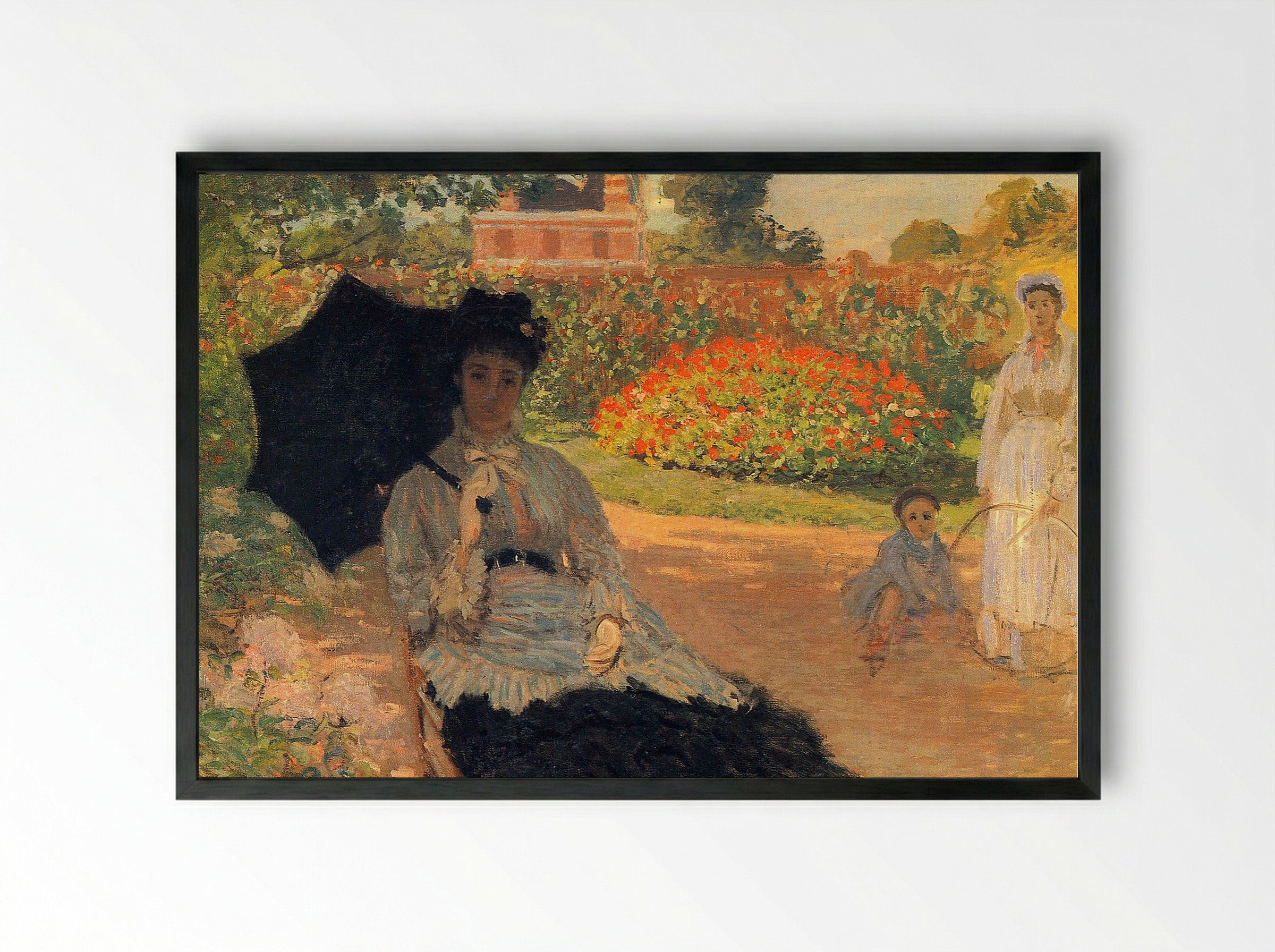 Camille Monet in the Garden at Argenteuil - Claude Monet - Framed Print Black