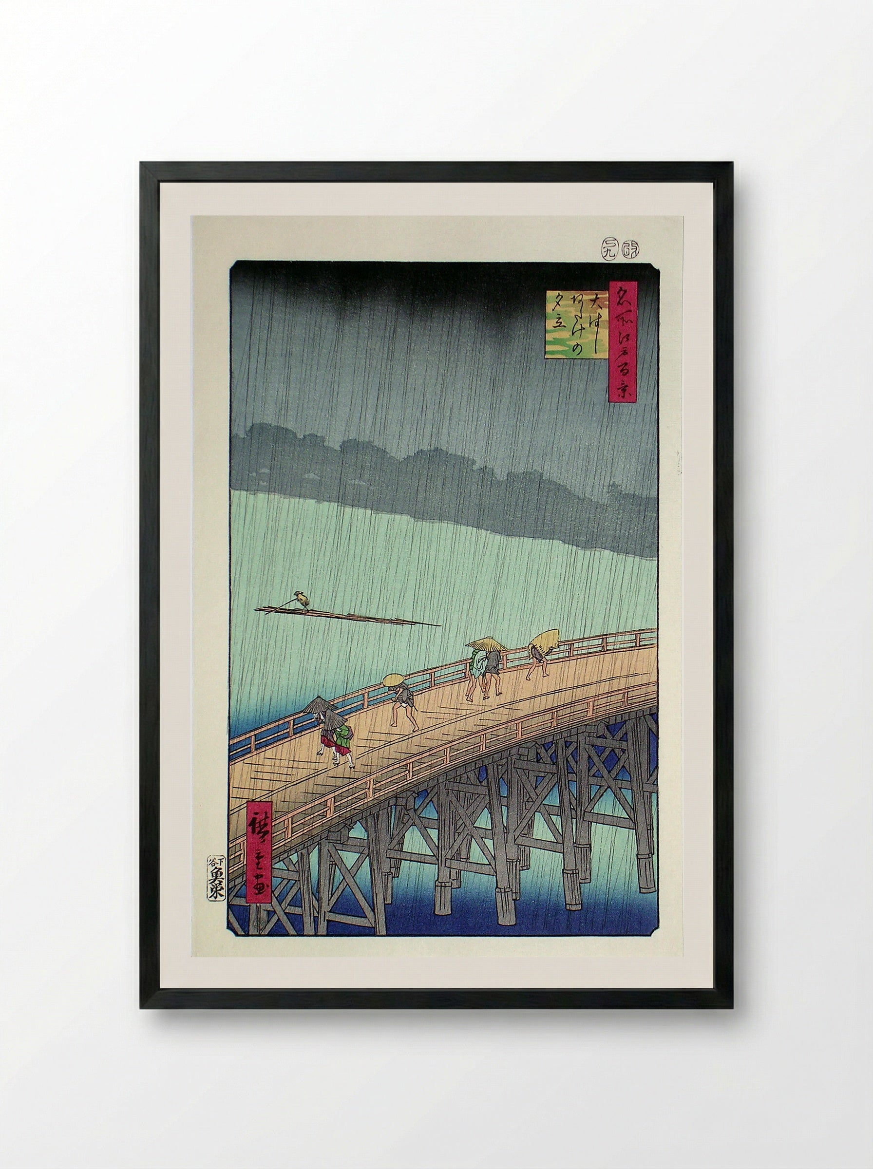 Sudden Shower over Shin-Ōhashi bridge and Atake - Utagawa Hiroshige - Framed Print Black