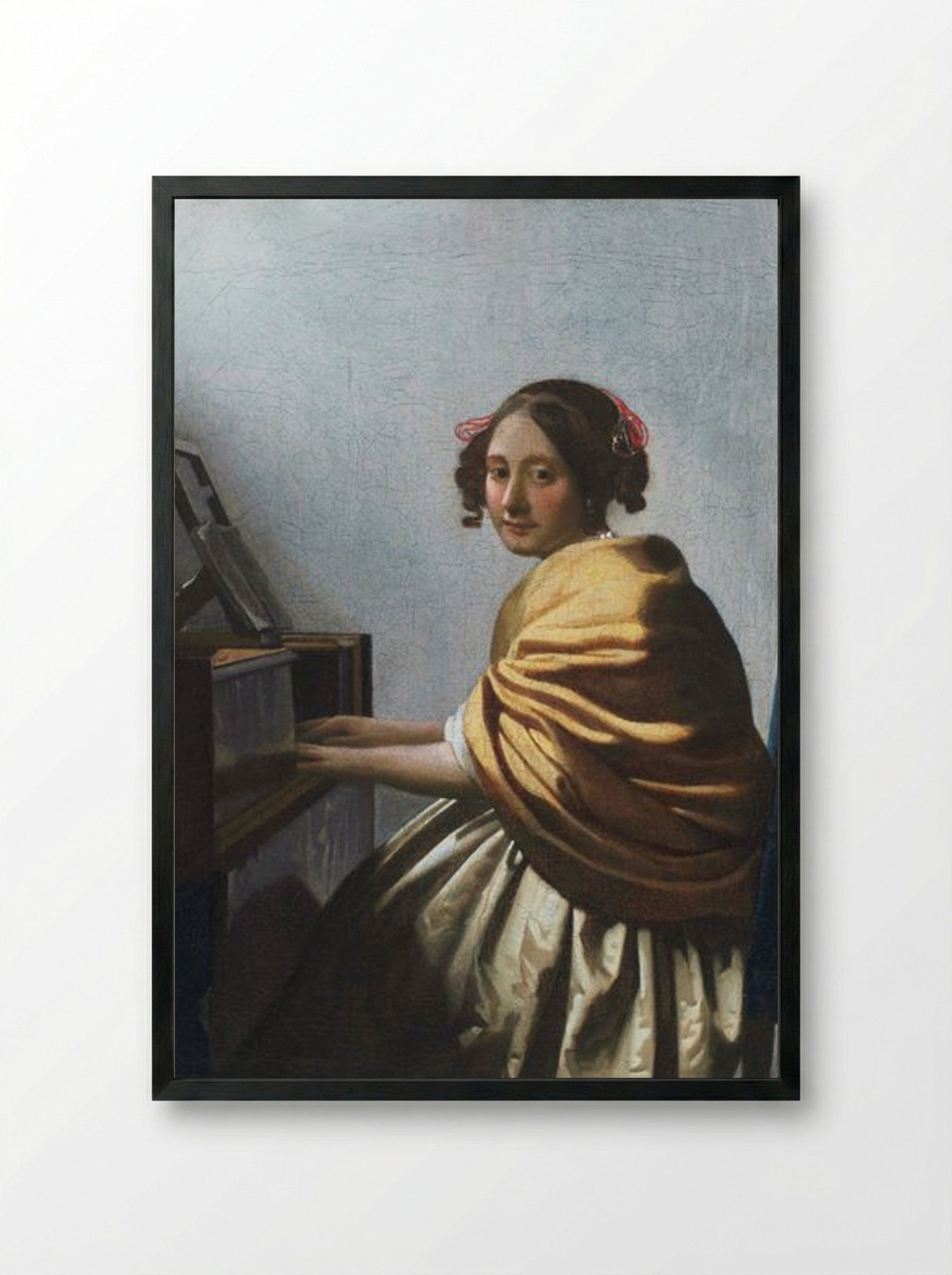 A Young Woman Seated at the Virginals - Johannes Vermeer - Framed Print Black