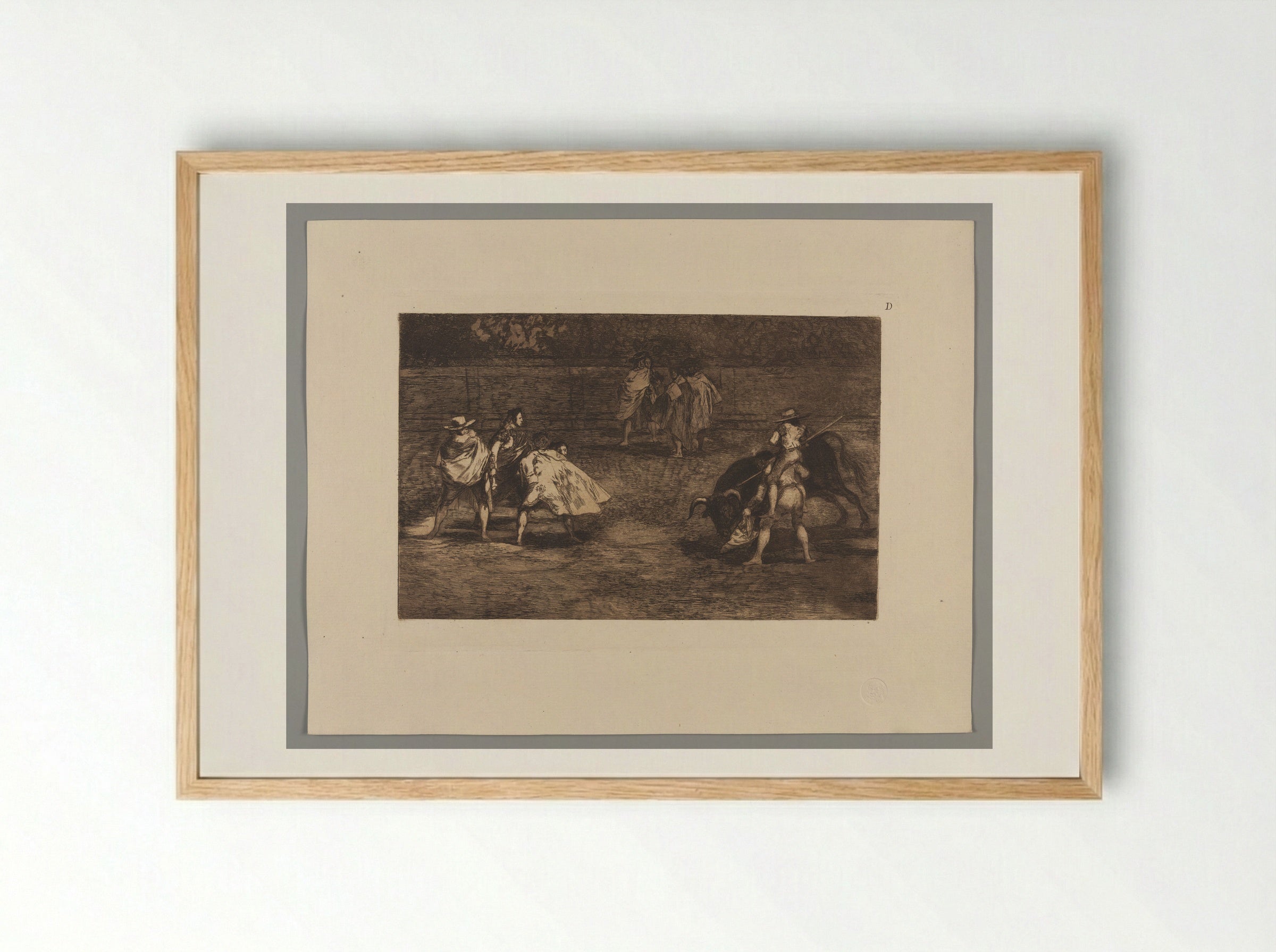 A Bullfighter, Mounted on the Shoulders of an Assistant, Spearing a Bull - Francisco José de Goya y Lucientes - Framed Print Wood