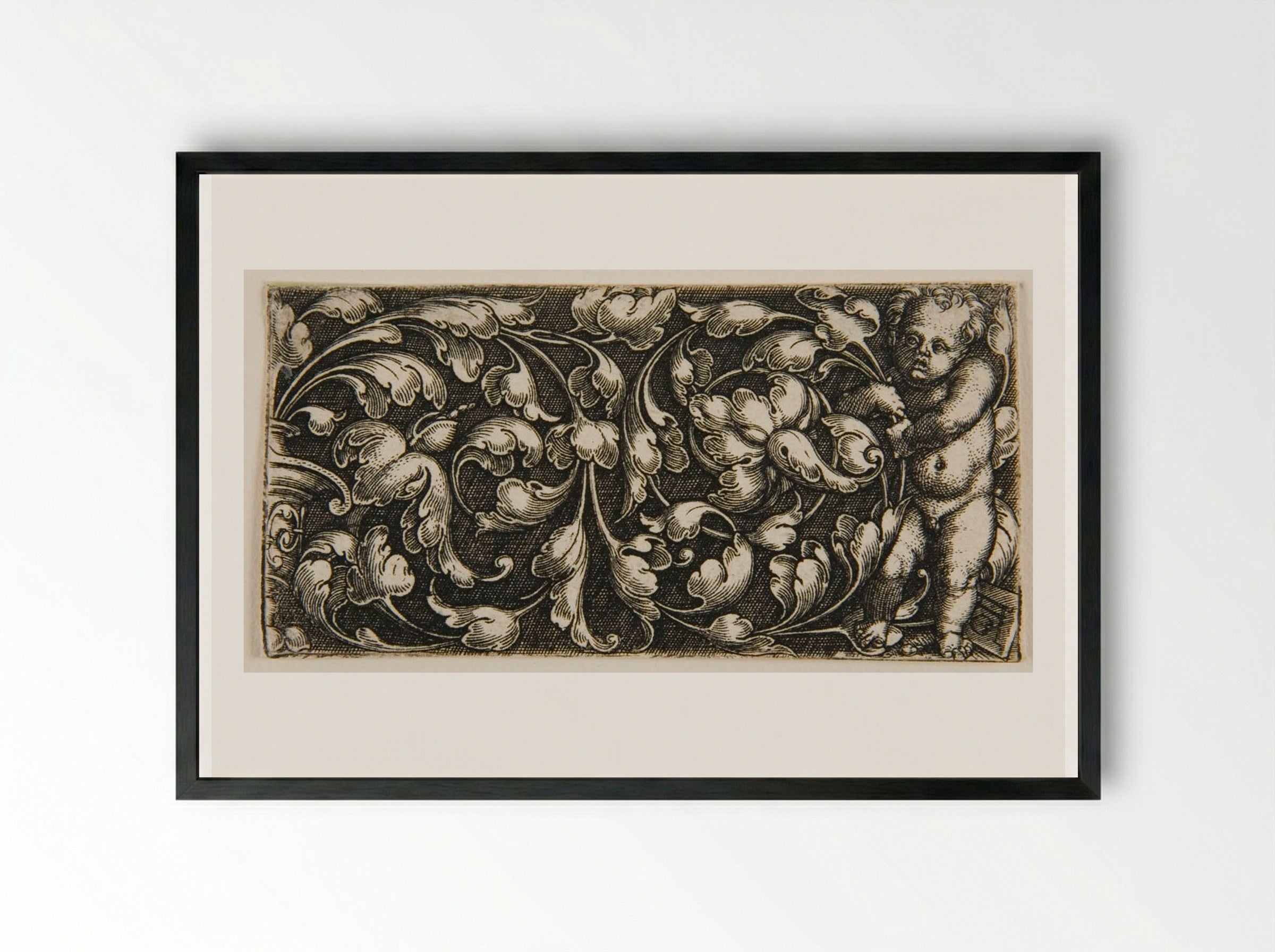 A Double Scroll of Leaf Ornament with a Putto Standing at the Right - Heinrich Aldegrever - Framed Print Black