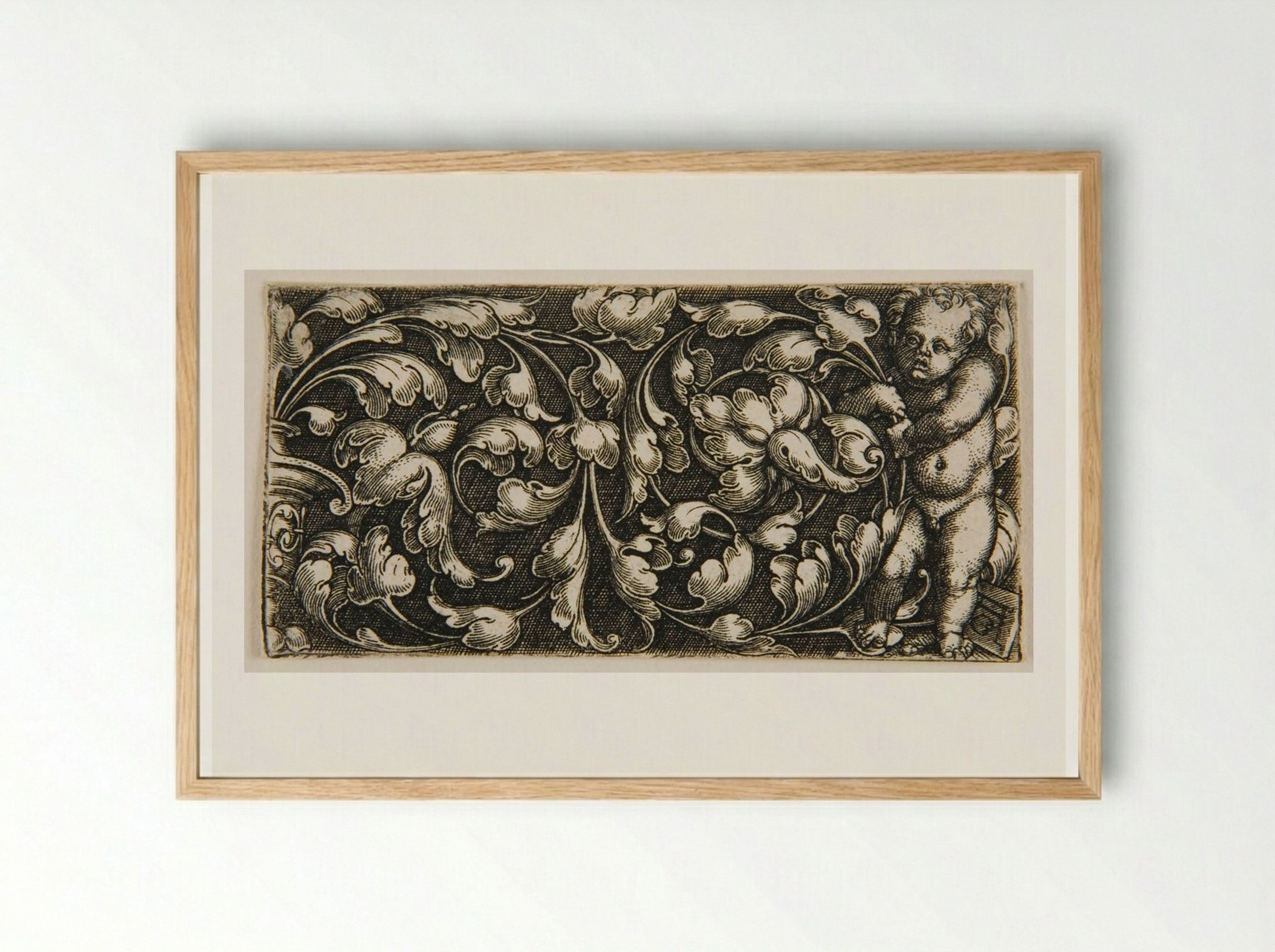 A Double Scroll of Leaf Ornament with a Putto Standing at the Right - Heinrich Aldegrever - Framed Print Wood