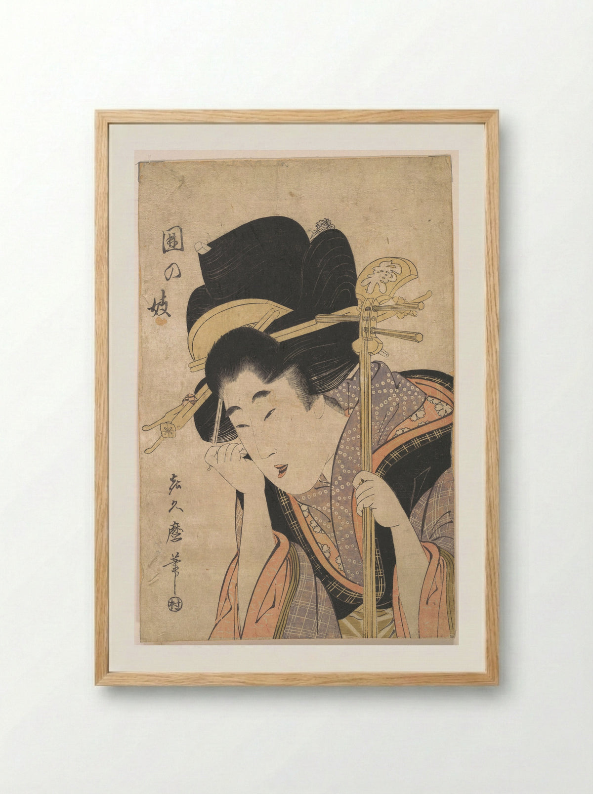 A Geisha with a Shamisen - Kitagawa Kikumaro - Framed Print Wood