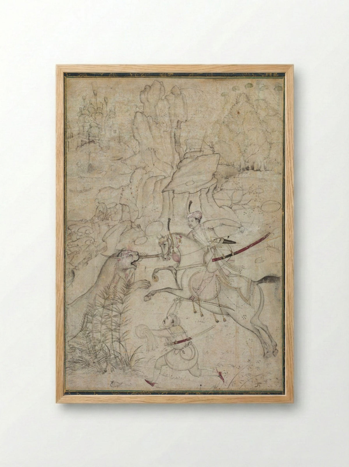 A Mounted Prince Hunting Lion in a Rocky Landscape - Khem Karan - Framed Print Wood