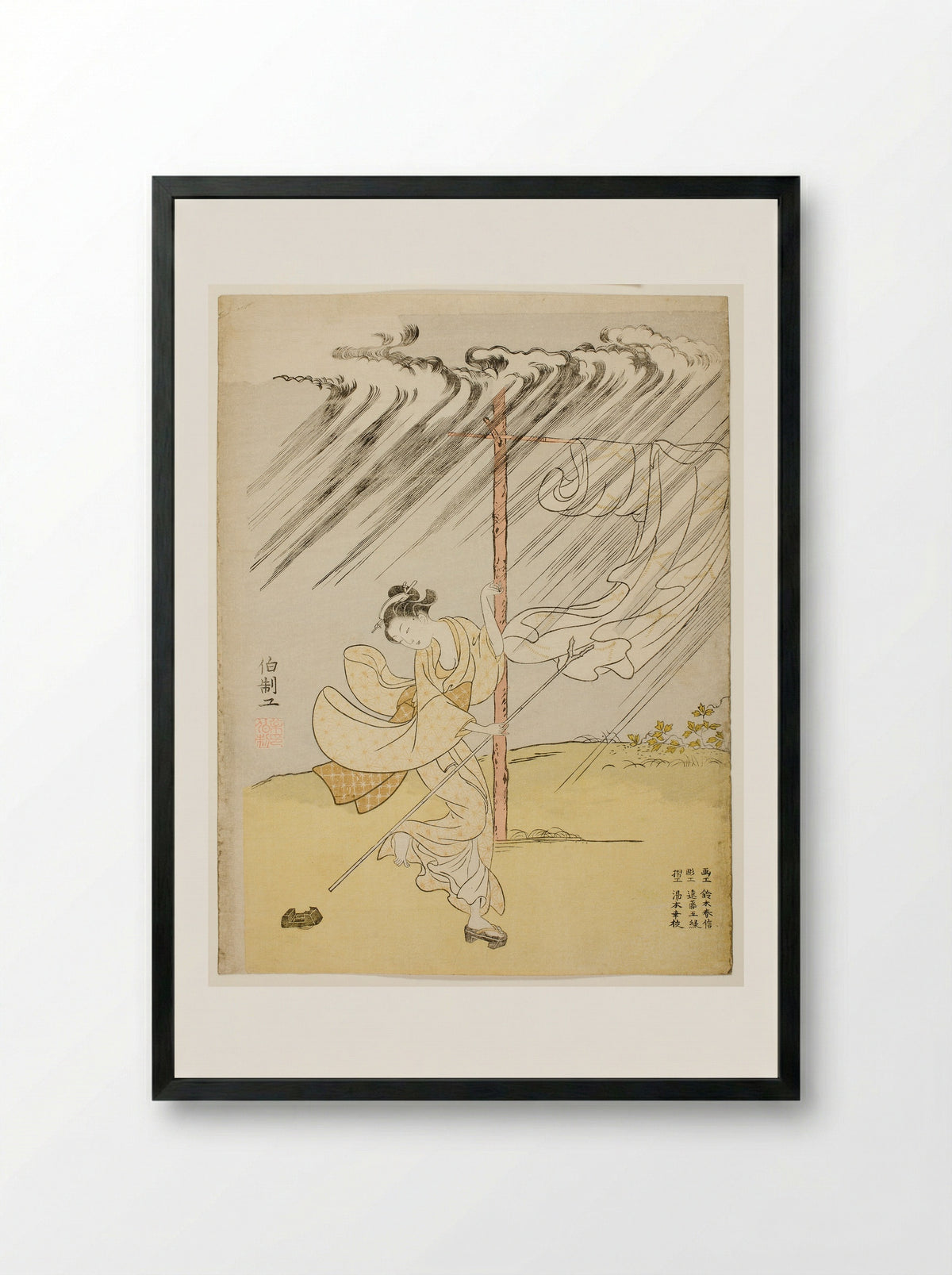 A Young Woman in a Summer Shower - Suzuki Harunobu - Framed Print Black