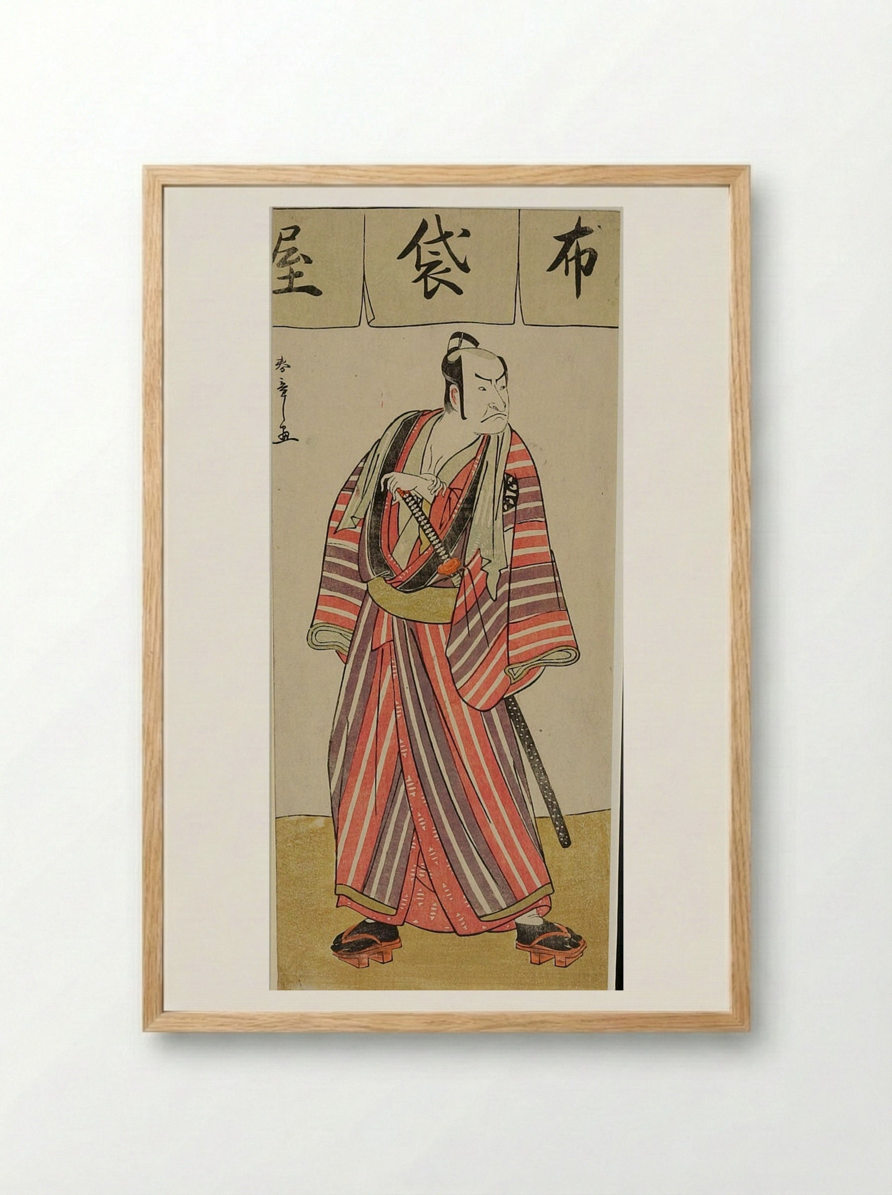 Actor Nakamura Denkūrō II in a Striped Robe - Katsukawa Shunshō - Framed Print Wood
