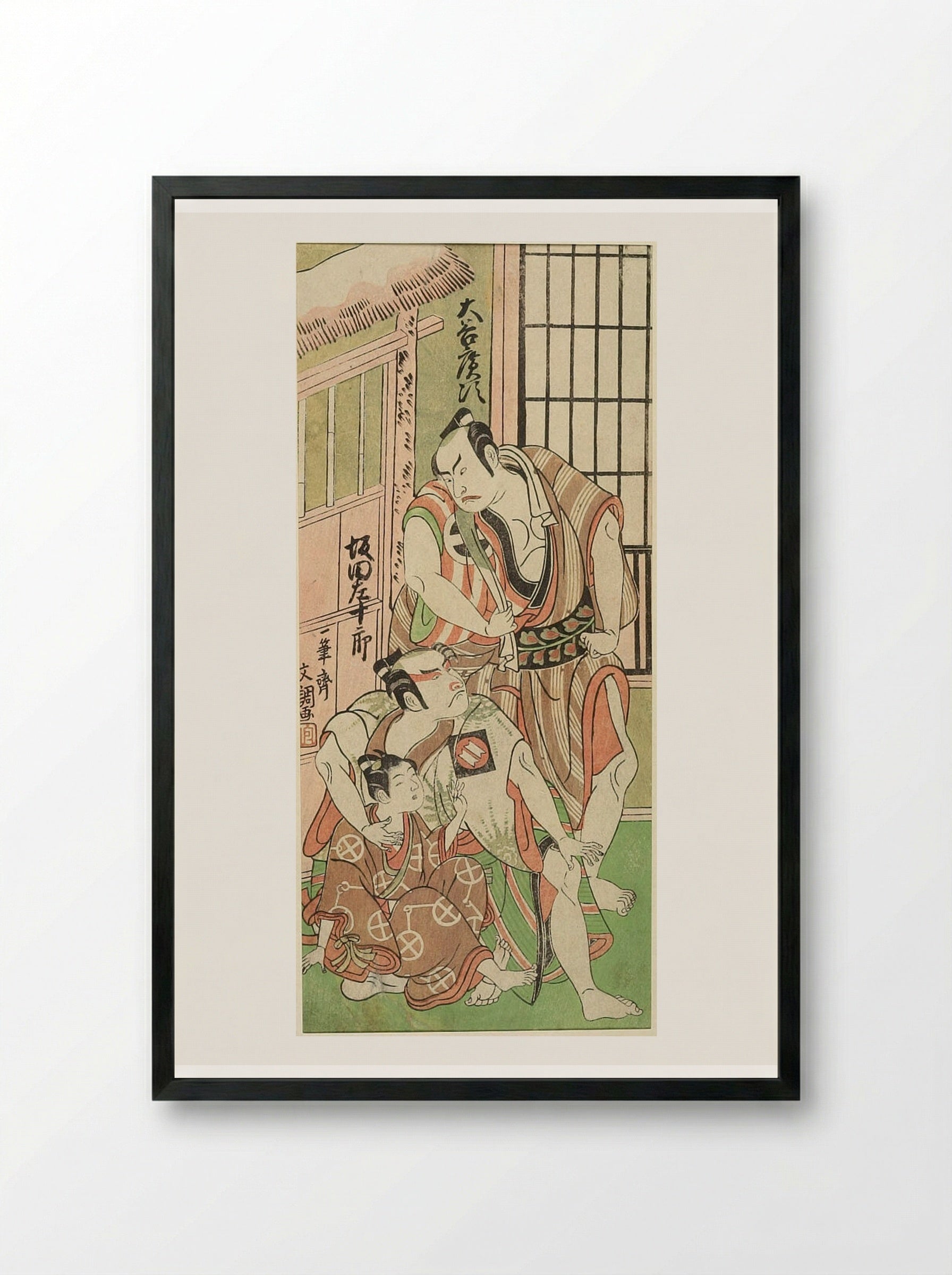 Actors Ōtani Hiroji III and Sakata Sajūrō as Wrestlers with a Boy - Ippitsusai Bunchō - Framed Print Black