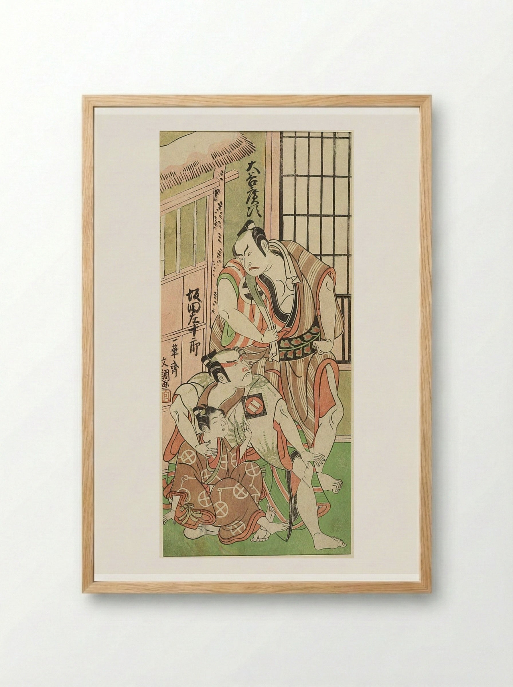 Actors Ōtani Hiroji III and Sakata Sajūrō as Wrestlers with a Boy - Ippitsusai Bunchō - Framed Print Wood