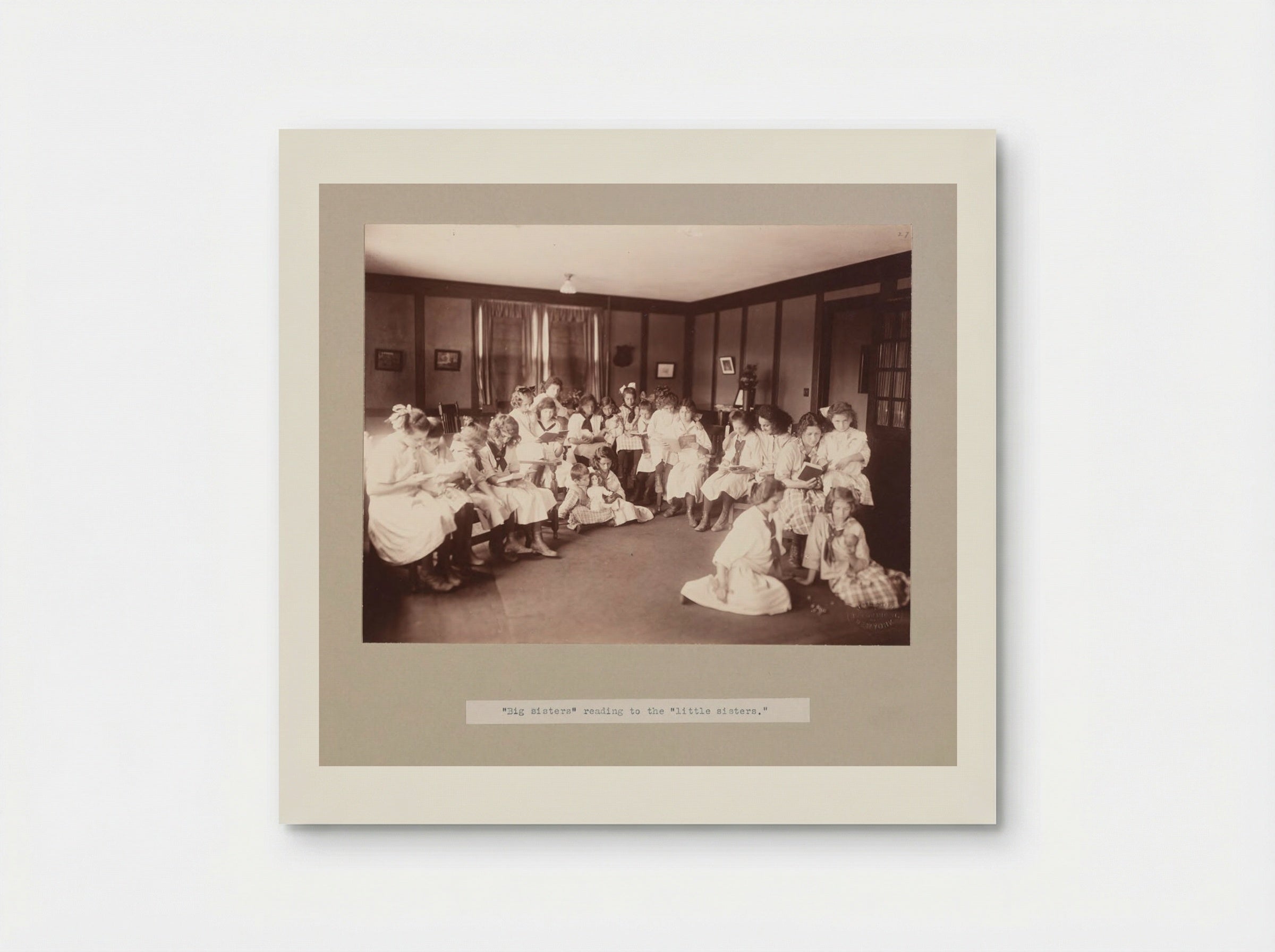 Big sisters reading to the little sisters - Wolfson - Poster