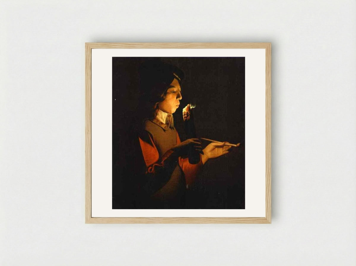 Boy Blowing on a Firebrand - Georges de la Tour - Framed Print Wood