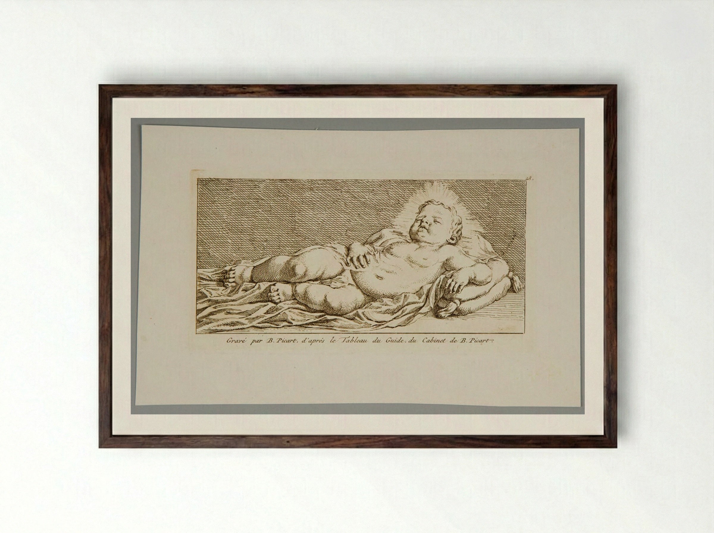 Christ Child Sleeping - Bernard Picart - Framed Print Dark Wood