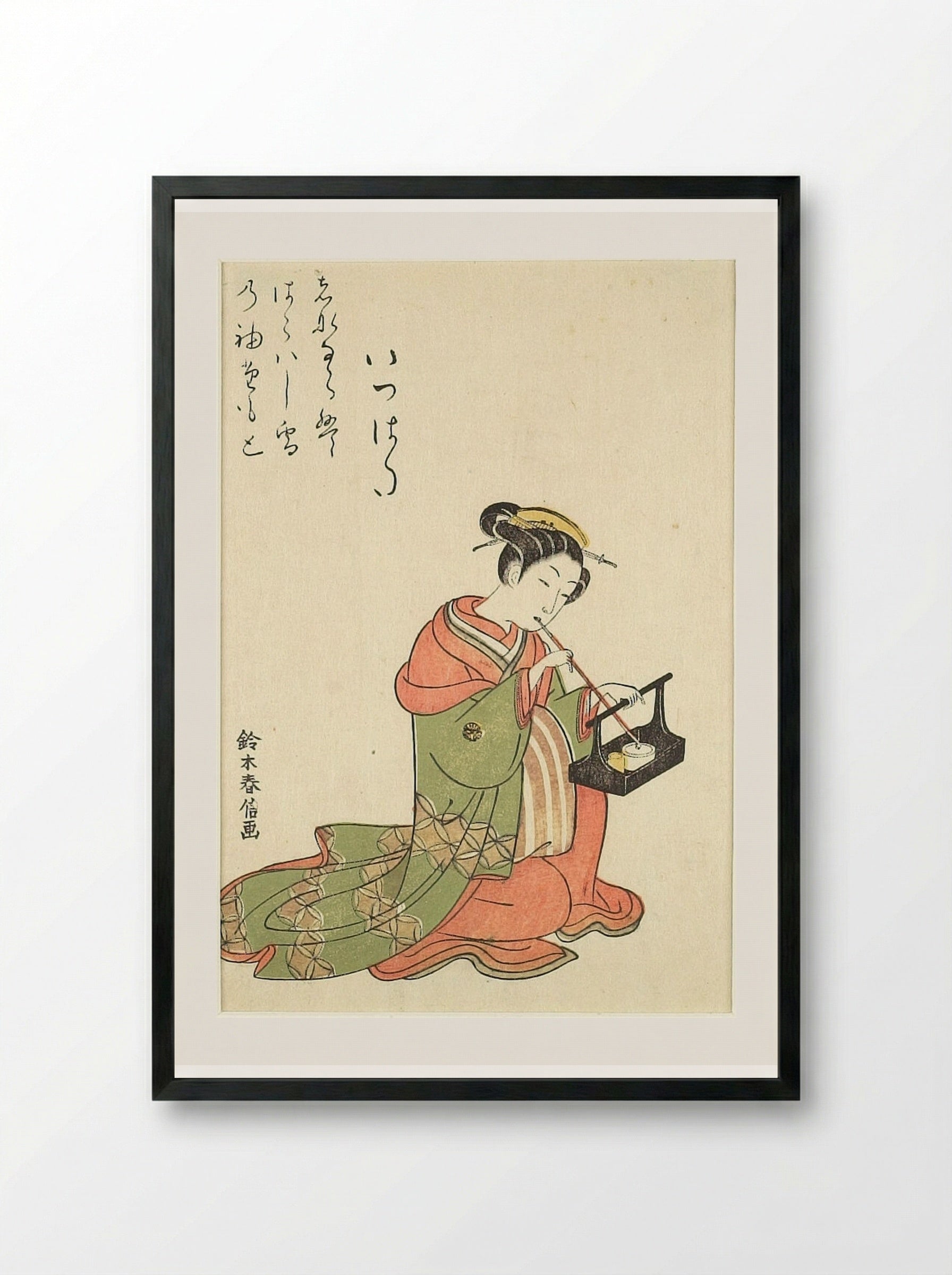 Courtesan Itsuhata Smoking Her Pipe - Suzuki Harunobu - Framed Print Black