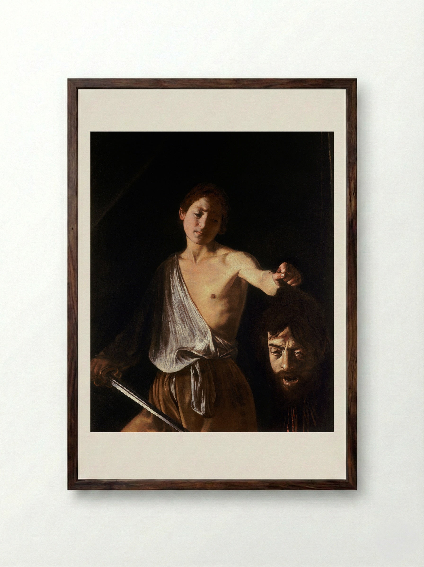 David with the Head of Goliath - Caravaggio - Framed Print Dark Wood