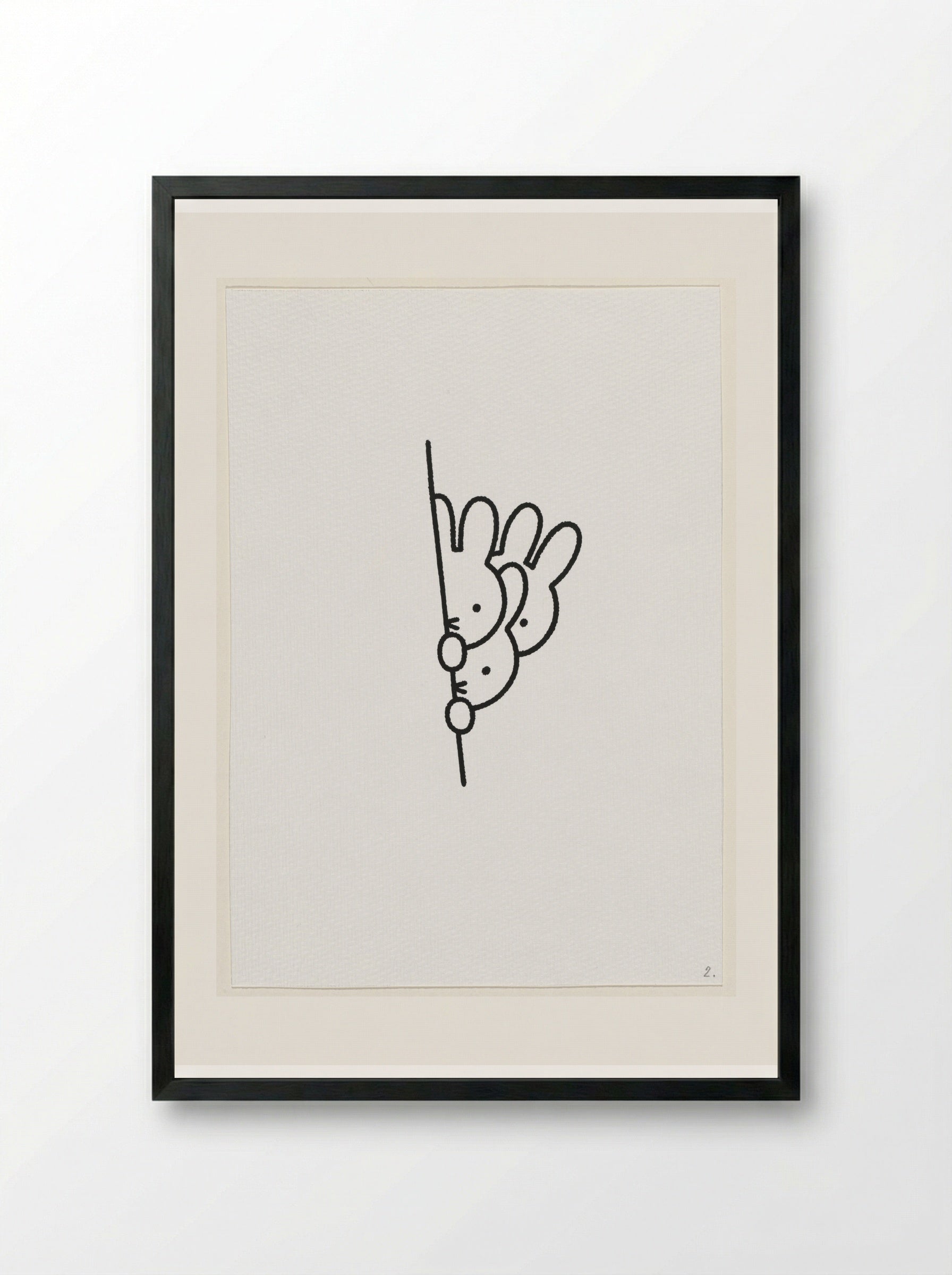 Drie konijnenhoofden achter muur - Dick Bruna - Framed Print Black