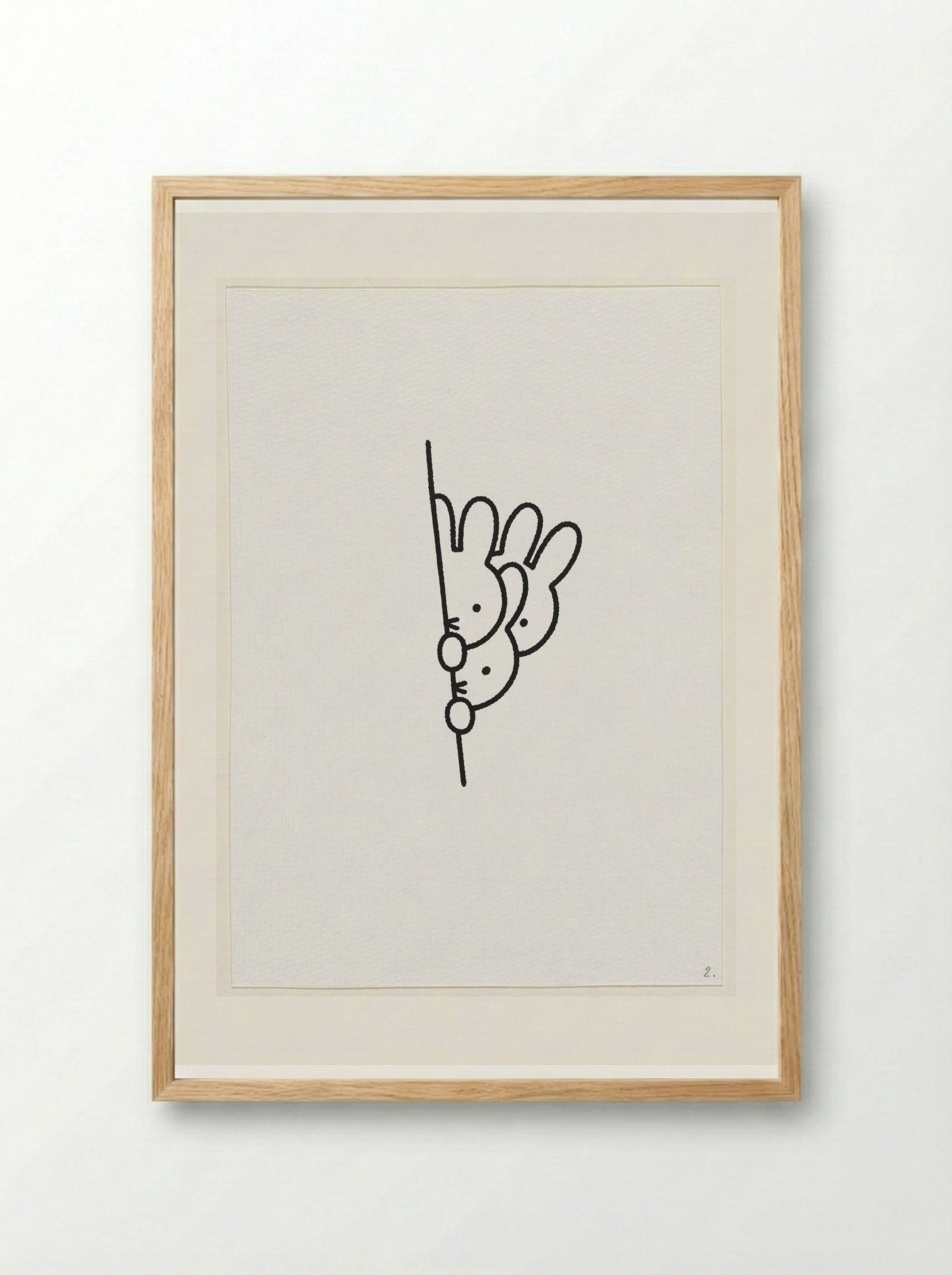 Drie konijnenhoofden achter muur - Dick Bruna - Framed Print Wood