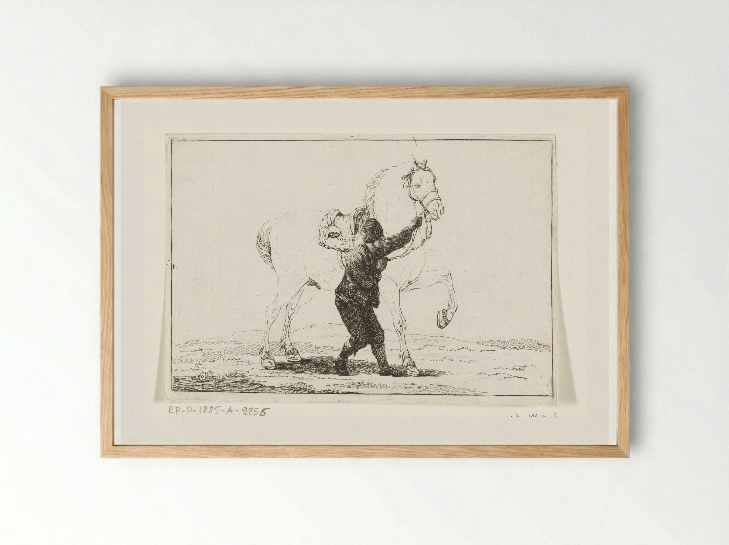 Een jongen houdt een paard aan de toom - Joannes Bemme - Framed Print Wood