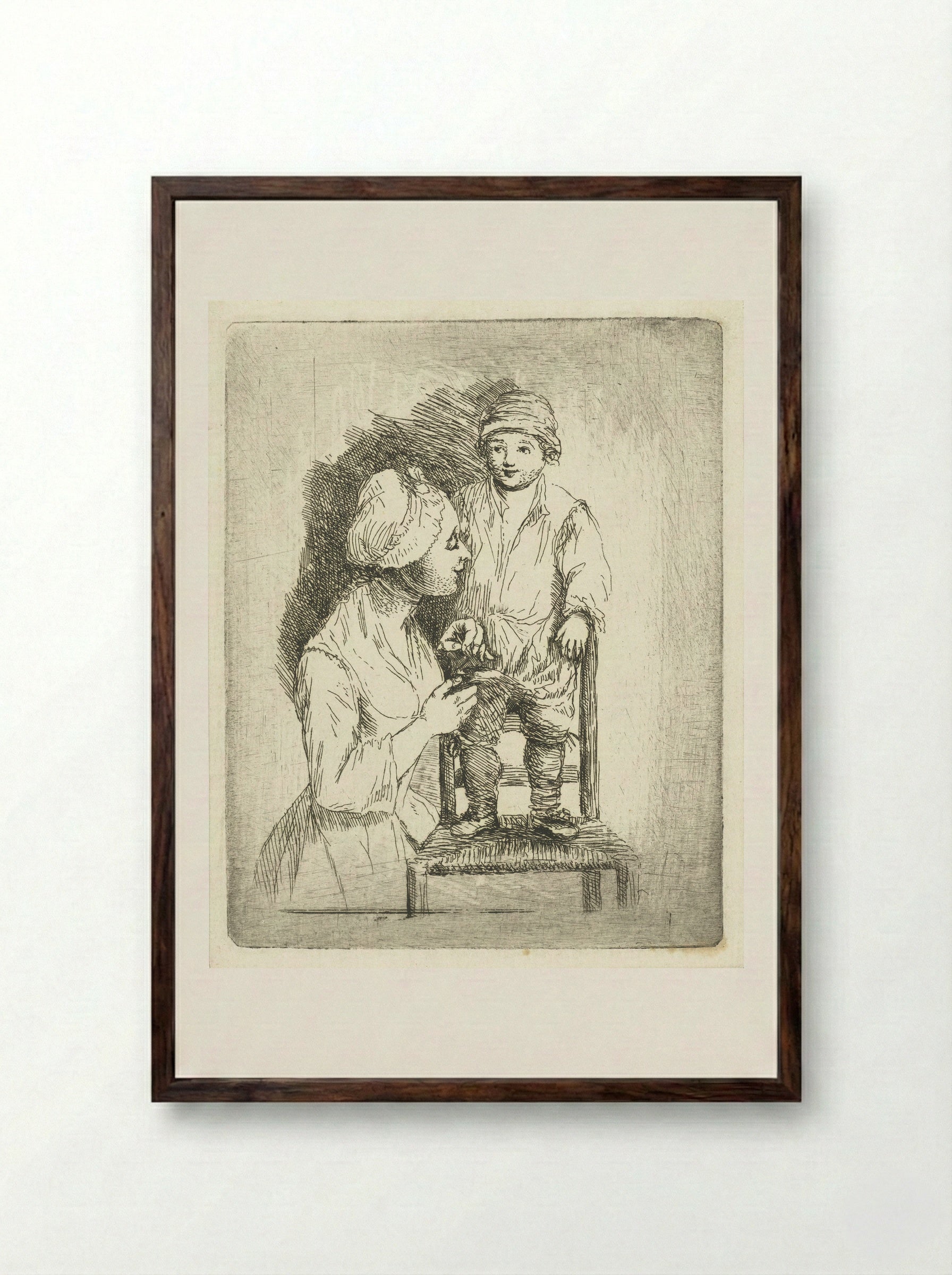 Een moeder zet een knoop aan de broek van haar zoon - Louis Bernard Coclers - Framed Print Dark Wood