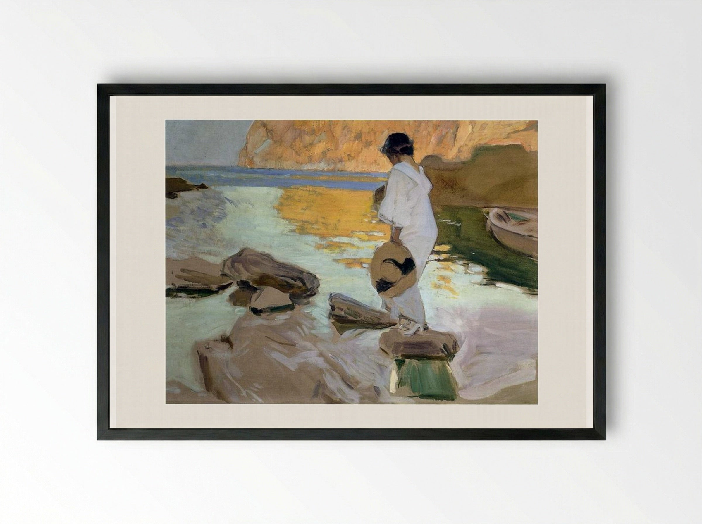 Elena in Cove, San Vicente at Majorca - Joaquín Sorolla - Framed Print Black