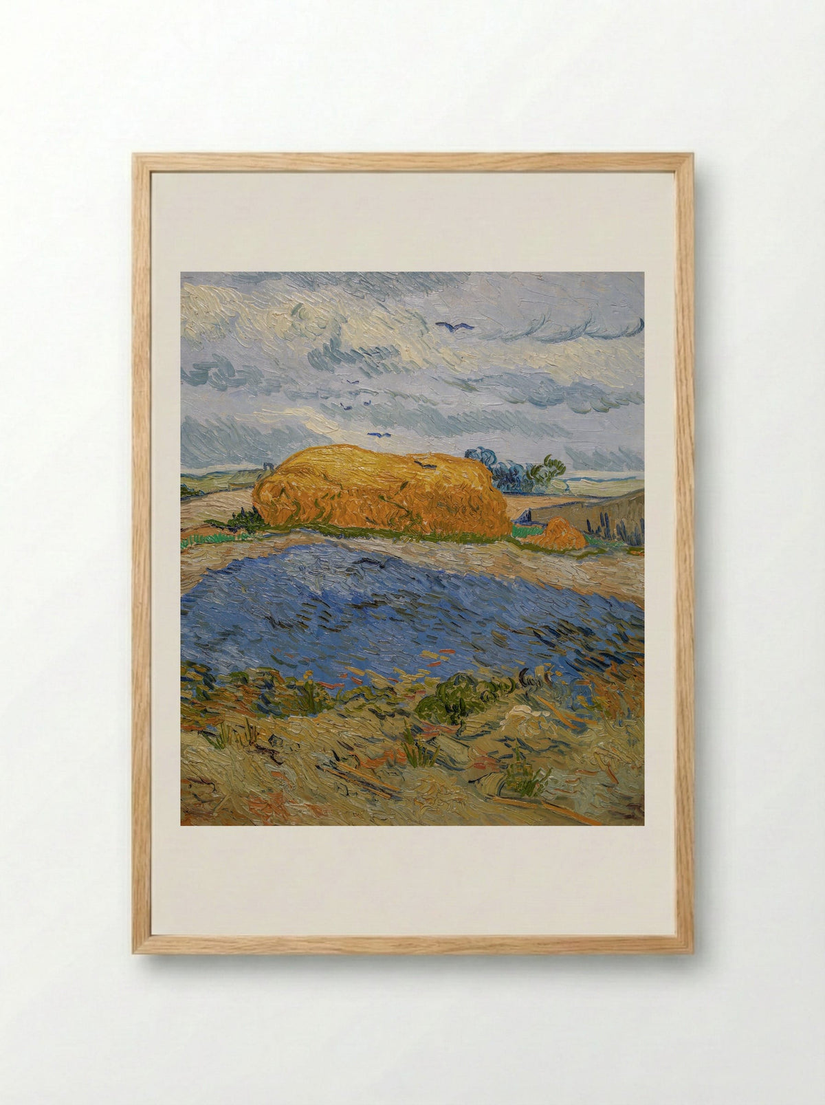 Haystack under a Rainy Sky - Vincent van Gogh - Framed Print Wood