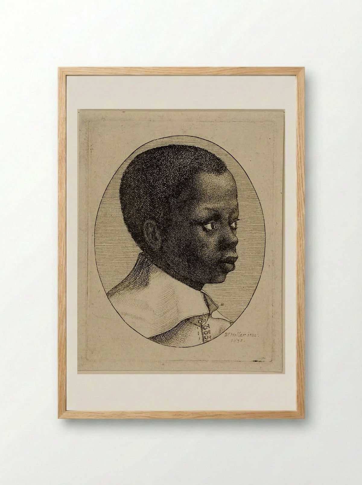 Head of a Young Black Boy in Profile to Right in an Oval - Wenceslaus Hollar - Framed Print Wood