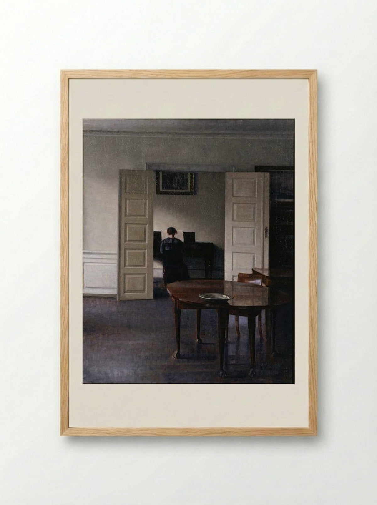 Interior with Ida Playing the Piano - Vilhelm Hammershoi - Framed Print Wood