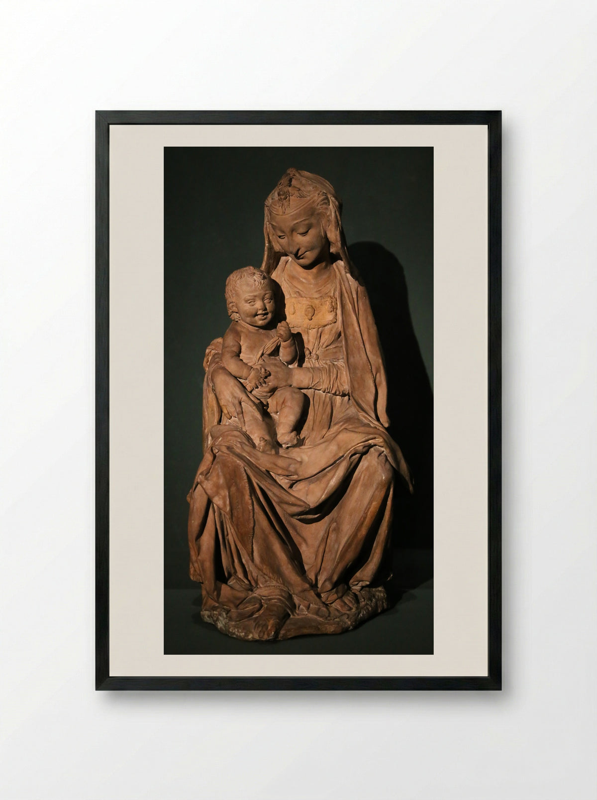 Madonna with the Laughing Child - Leonardo da Vinci - Framed Print Black