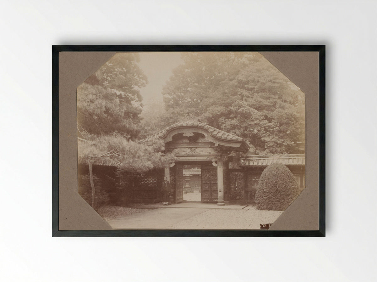 Man at the Gate of a Temple in Shiba, Tokyo - Kusakabe Kimbei - Framed Print Black