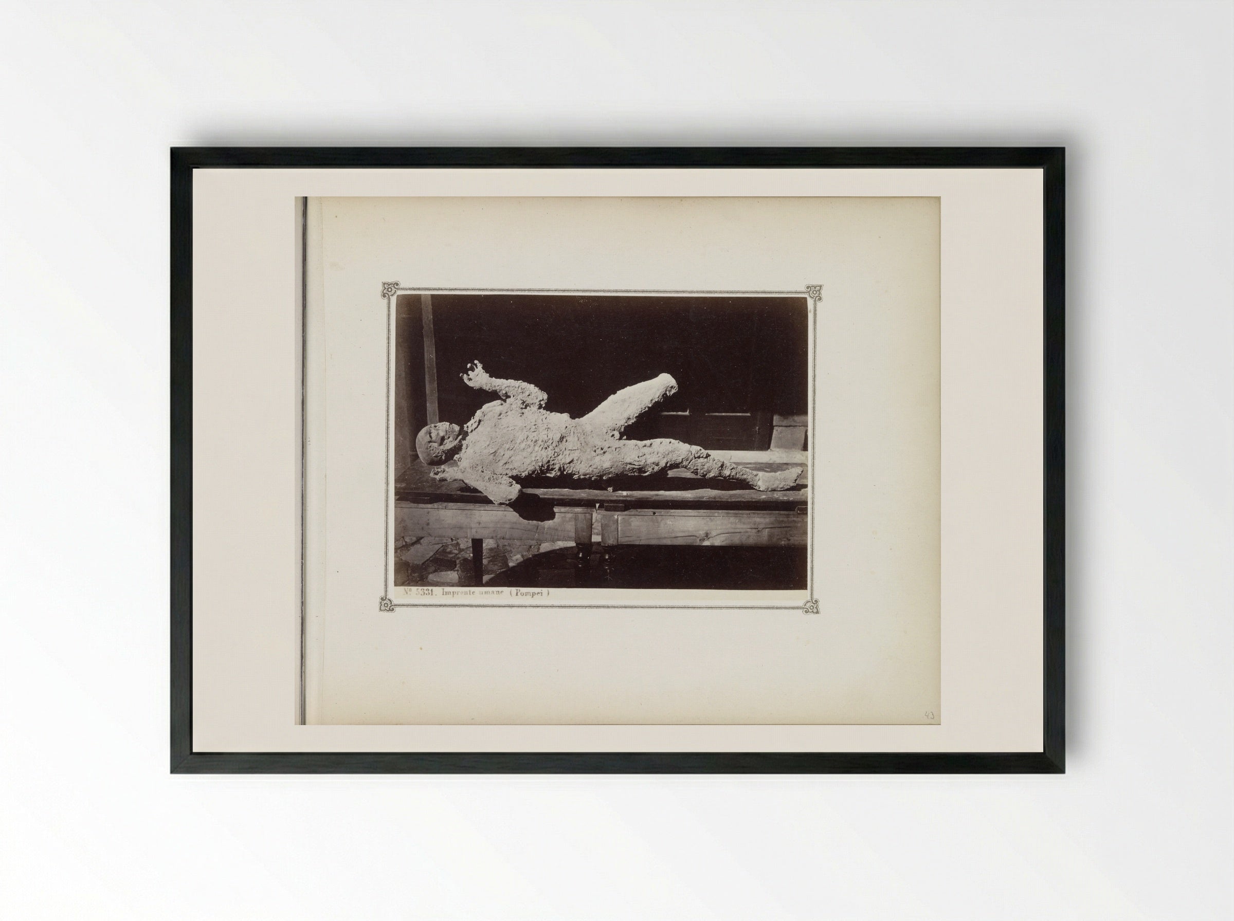 Plaster Cast of a Victim of the Eruption of Vesuvius - Giorgio Sommer - Framed Print Black