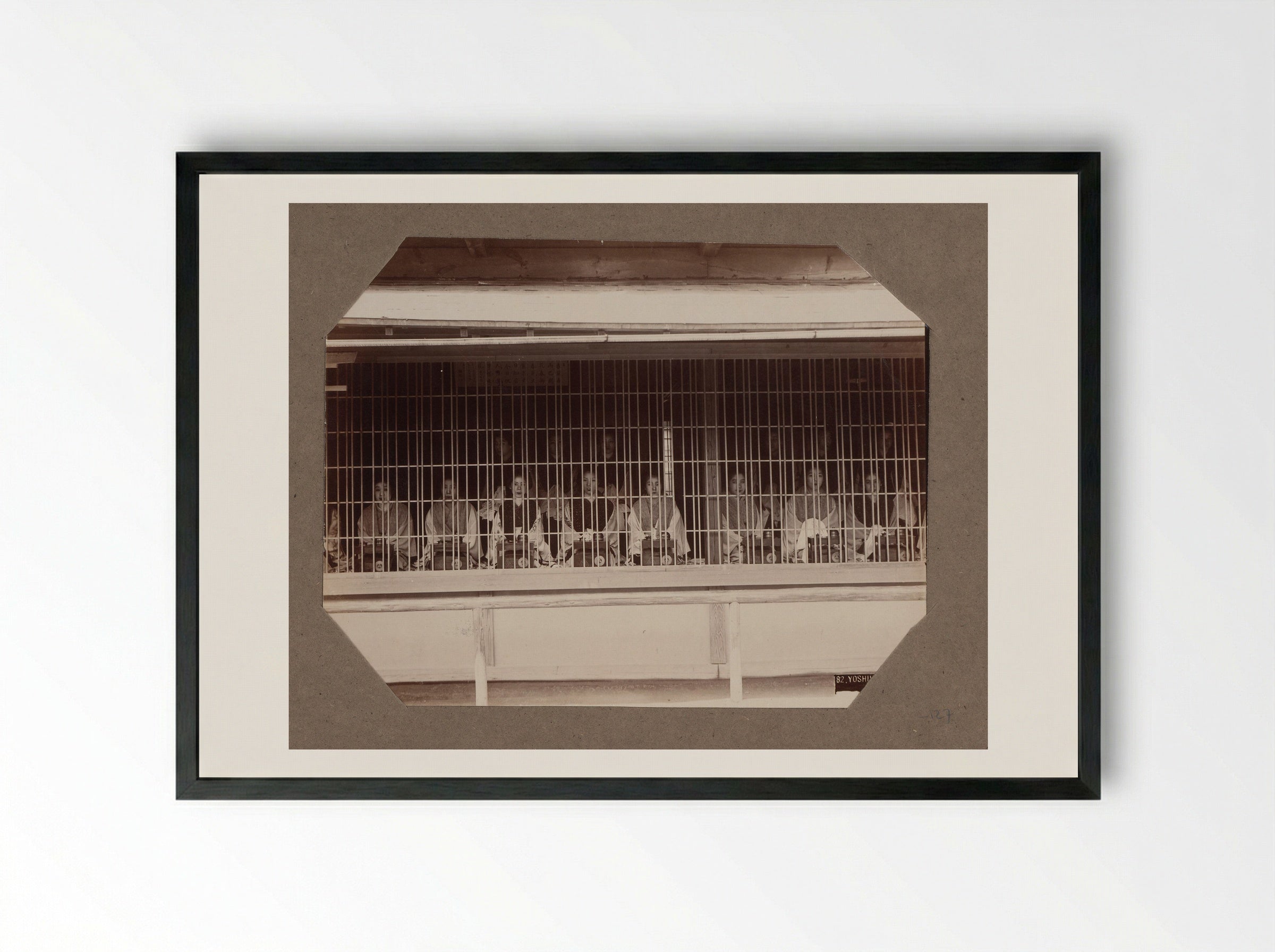 Prostitutes Behind a Lattice in Yoshiwara, Tokyo - Kusakabe Kimbei - Framed Print Black