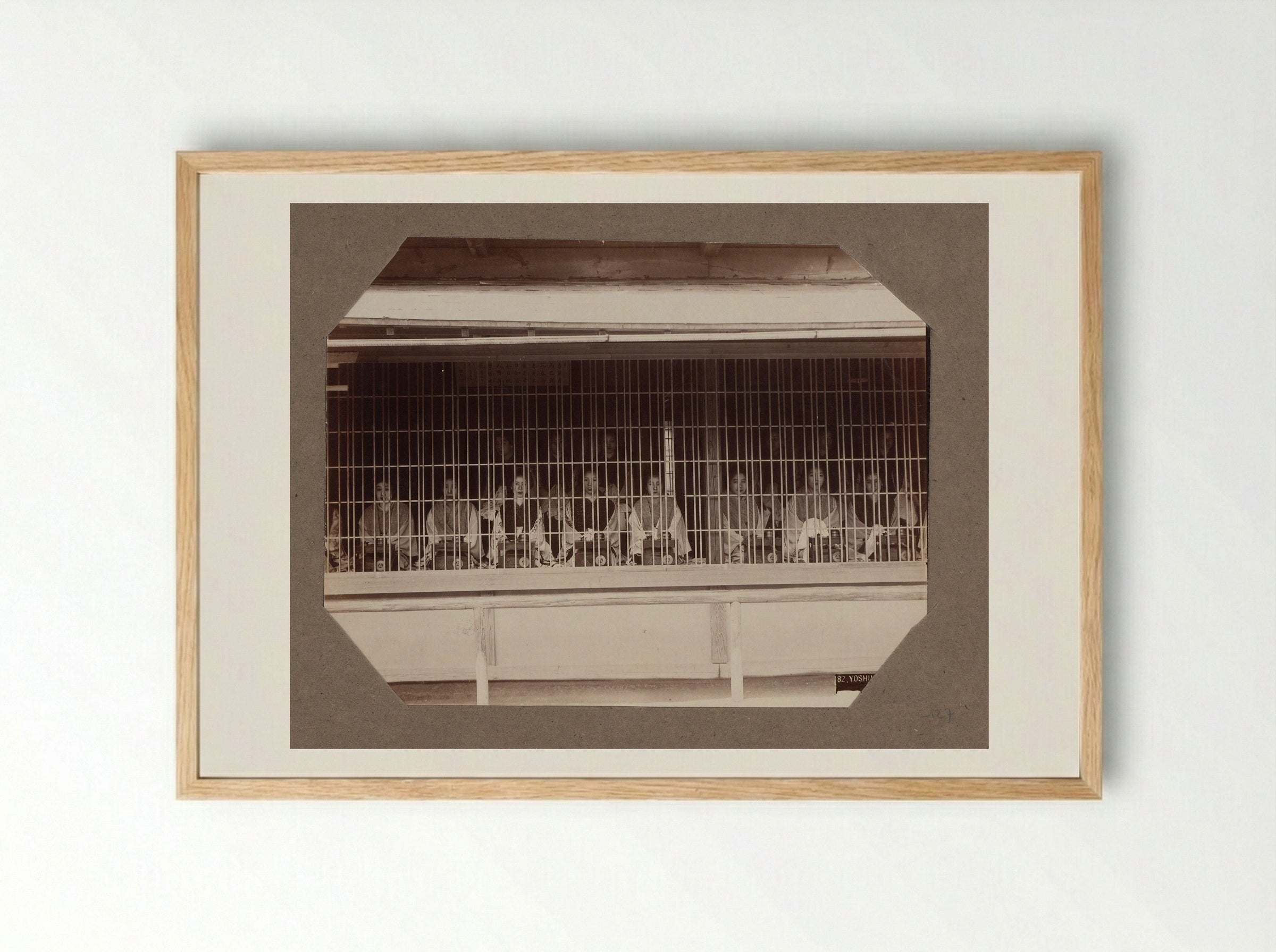 Prostitutes Behind a Lattice in Yoshiwara, Tokyo - Kusakabe Kimbei - Framed Print Wood