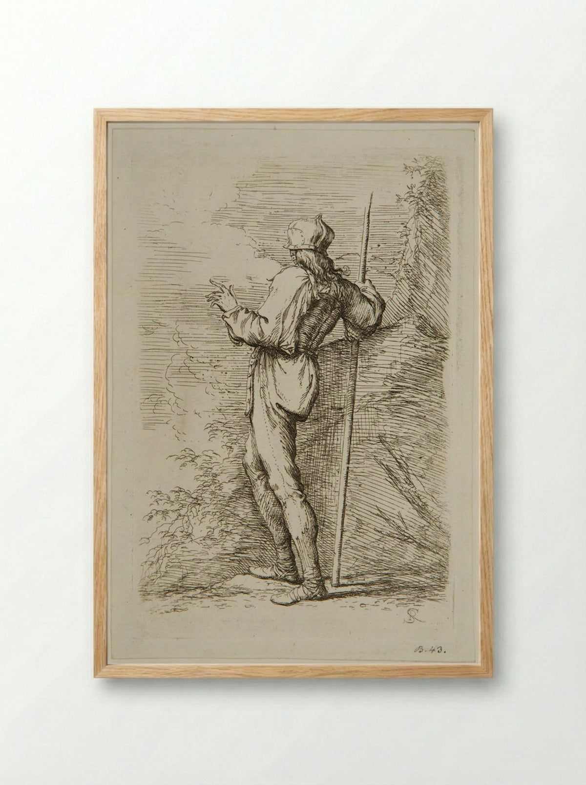 Soldier with a Staff Standing Next to a Large Rock - Salvator Rosa - Framed Print Wood