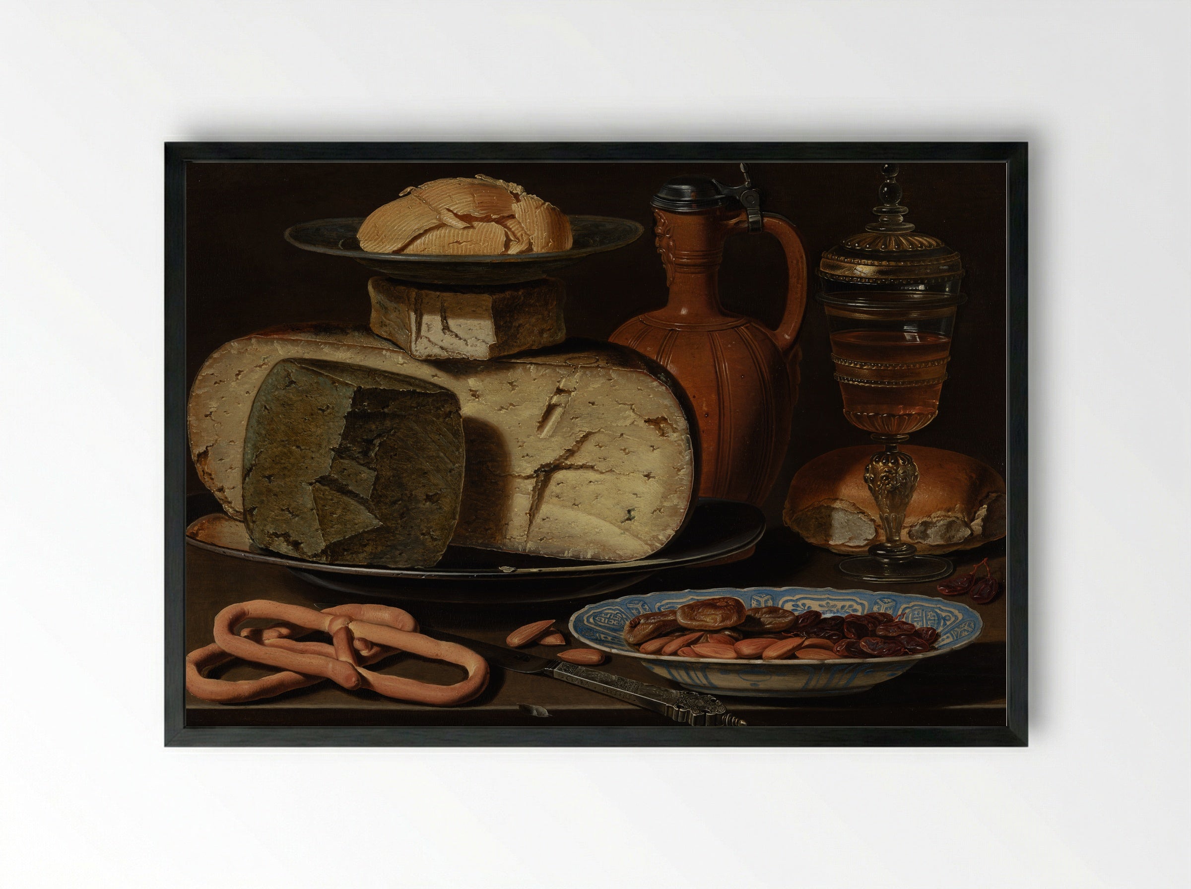 Still Life with Cheeses, Almonds and Pretzels - Clara Peeters - Framed Print Black