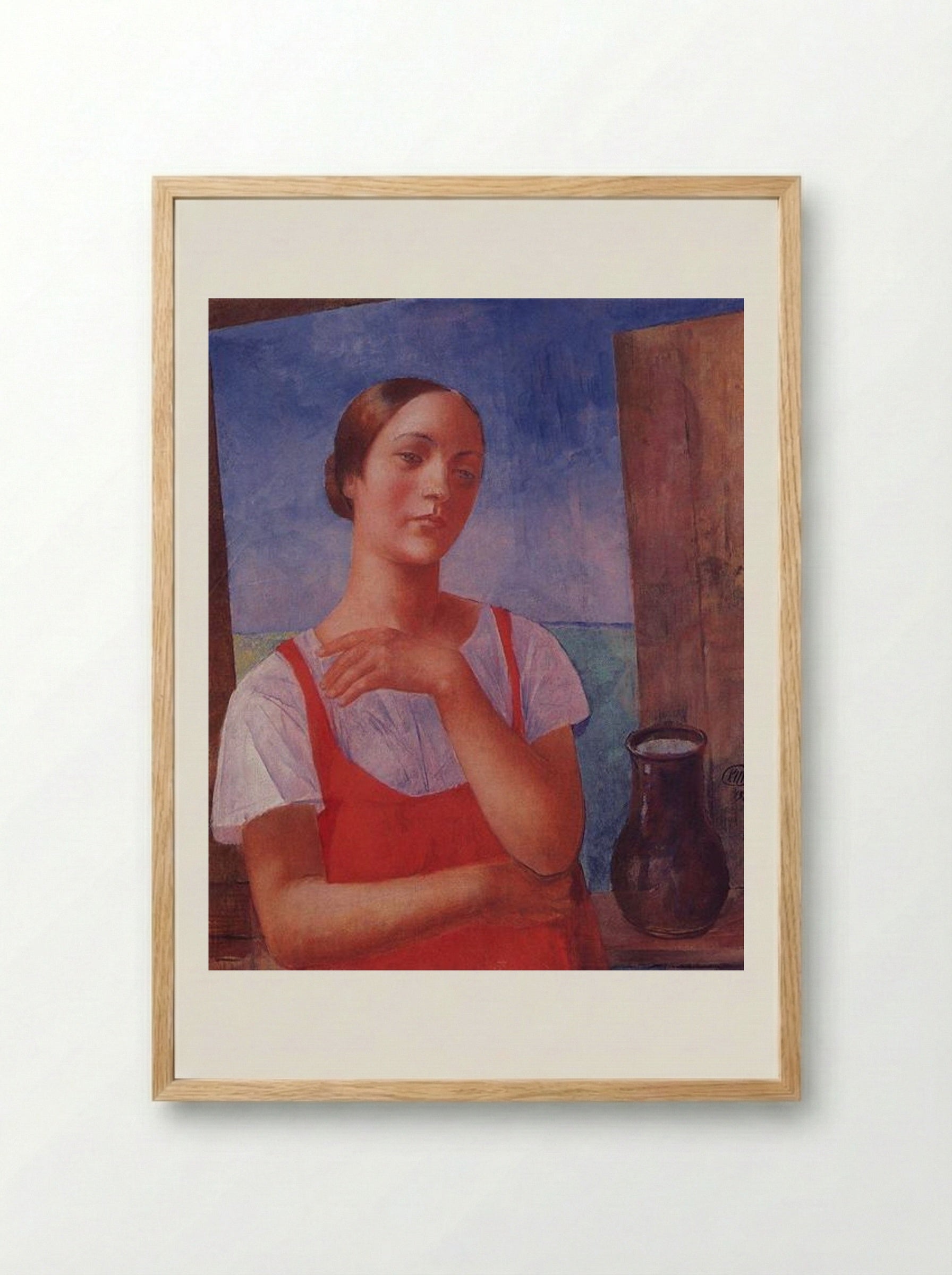 The Girl in a Sarafan - Kuzma Petrov-Vodkin - Framed Print Wood