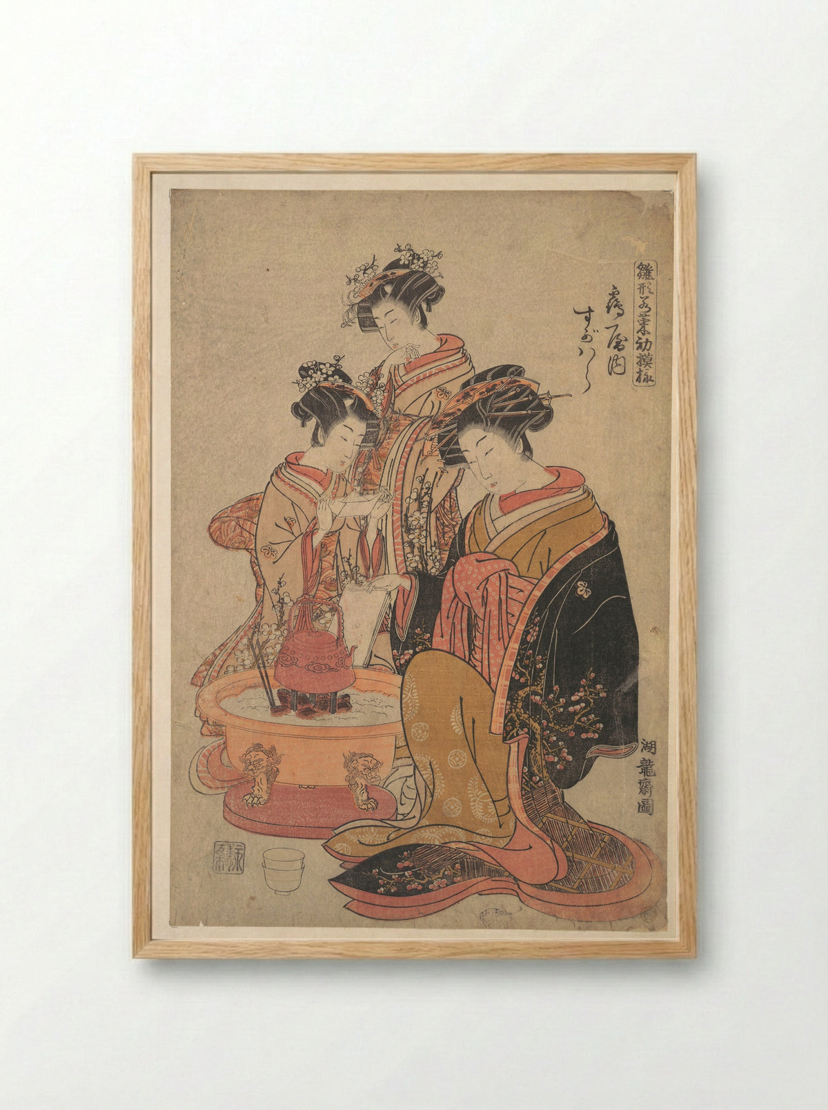 The Oiran Sugawara of Tsuru-ya seated beside a hibachi - Isoda Koryūsai - Framed Print Wood