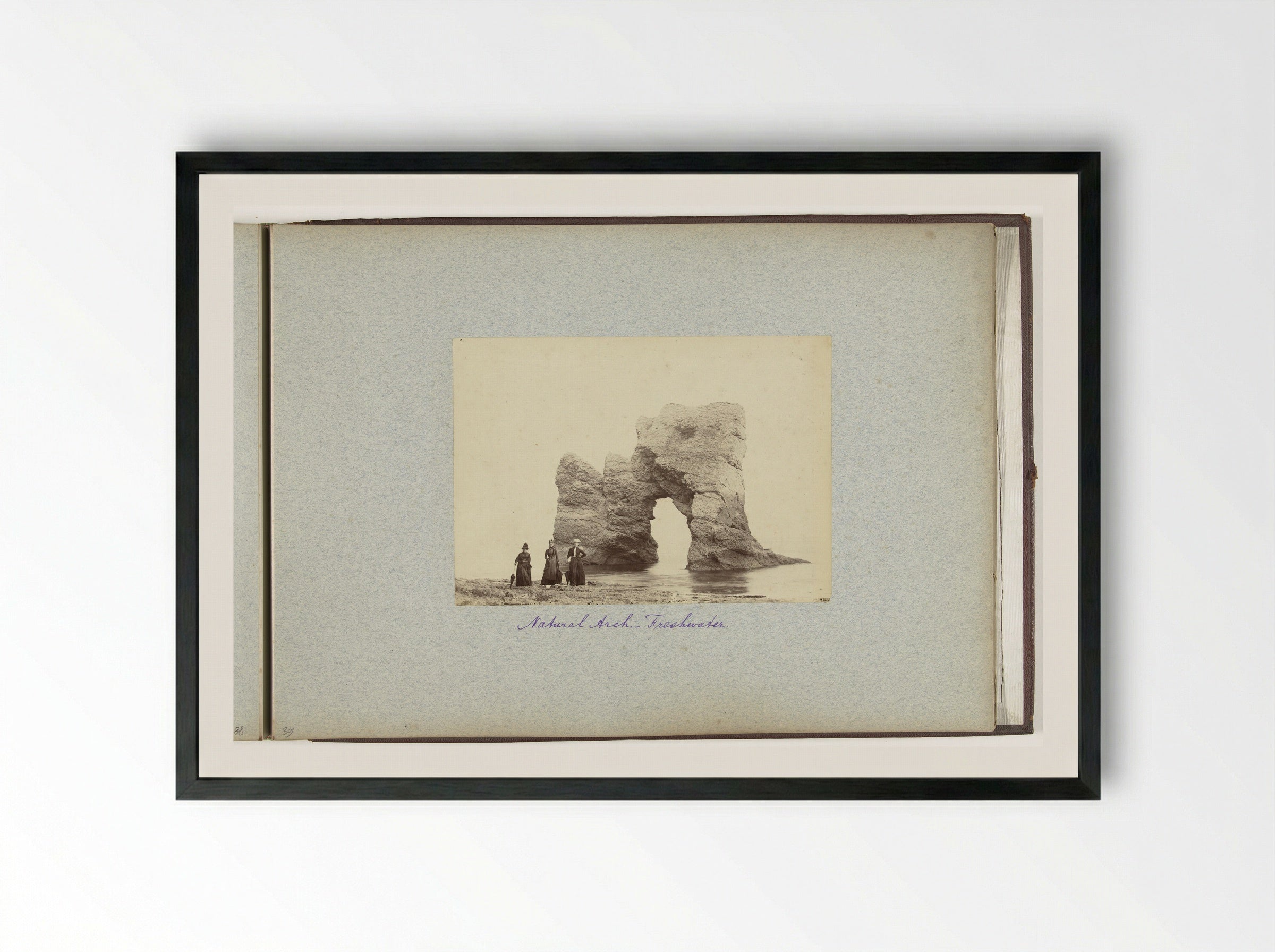 Three Women Before a Rock Arch at Freshwater Bay, Isle of Wight - Henry Pauw van Wieldrecht - Framed Print Black