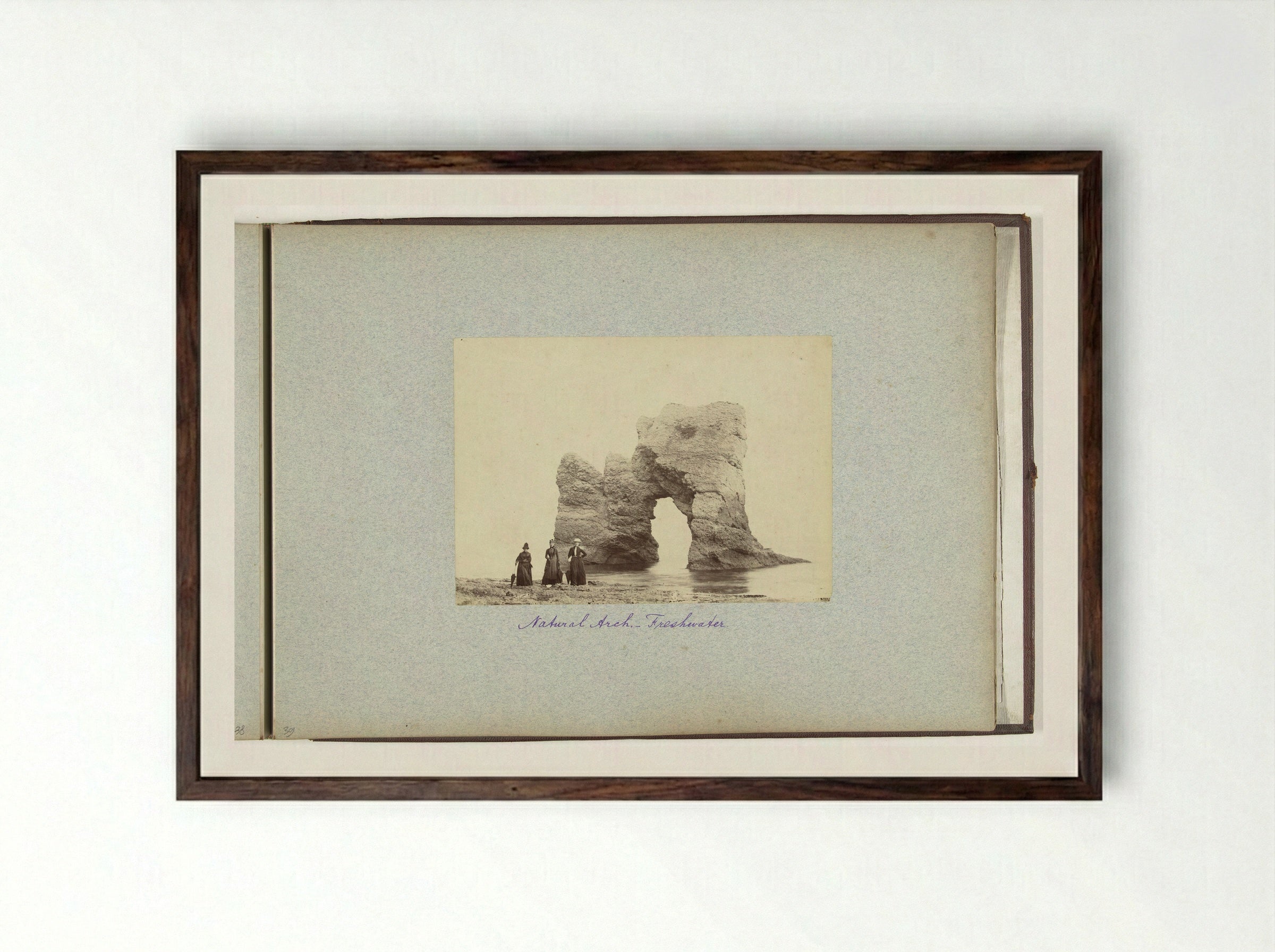 Three Women Before a Rock Arch at Freshwater Bay, Isle of Wight - Henry Pauw van Wieldrecht - Framed Print Dark Wood