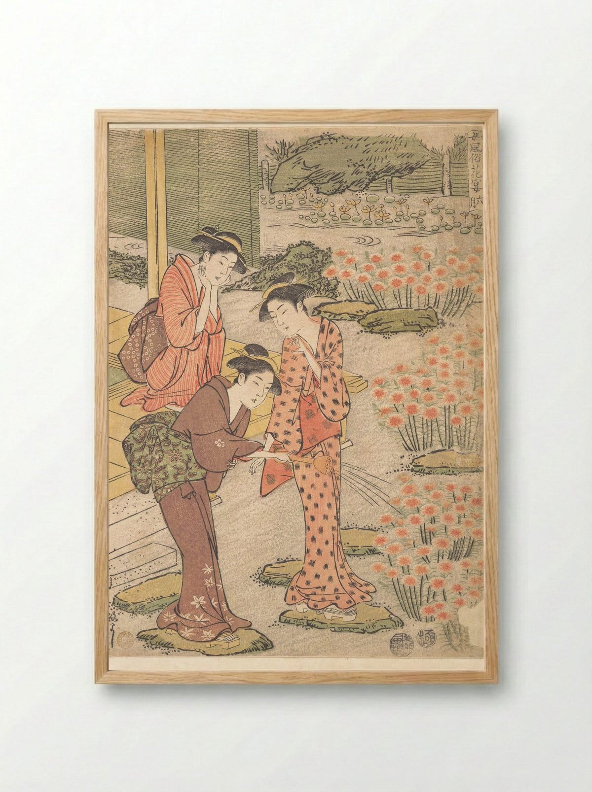 Three Young Women in a Garden where Nadeshiko Pinks are Growing - Kuwagata Keisai - Framed Print Wood