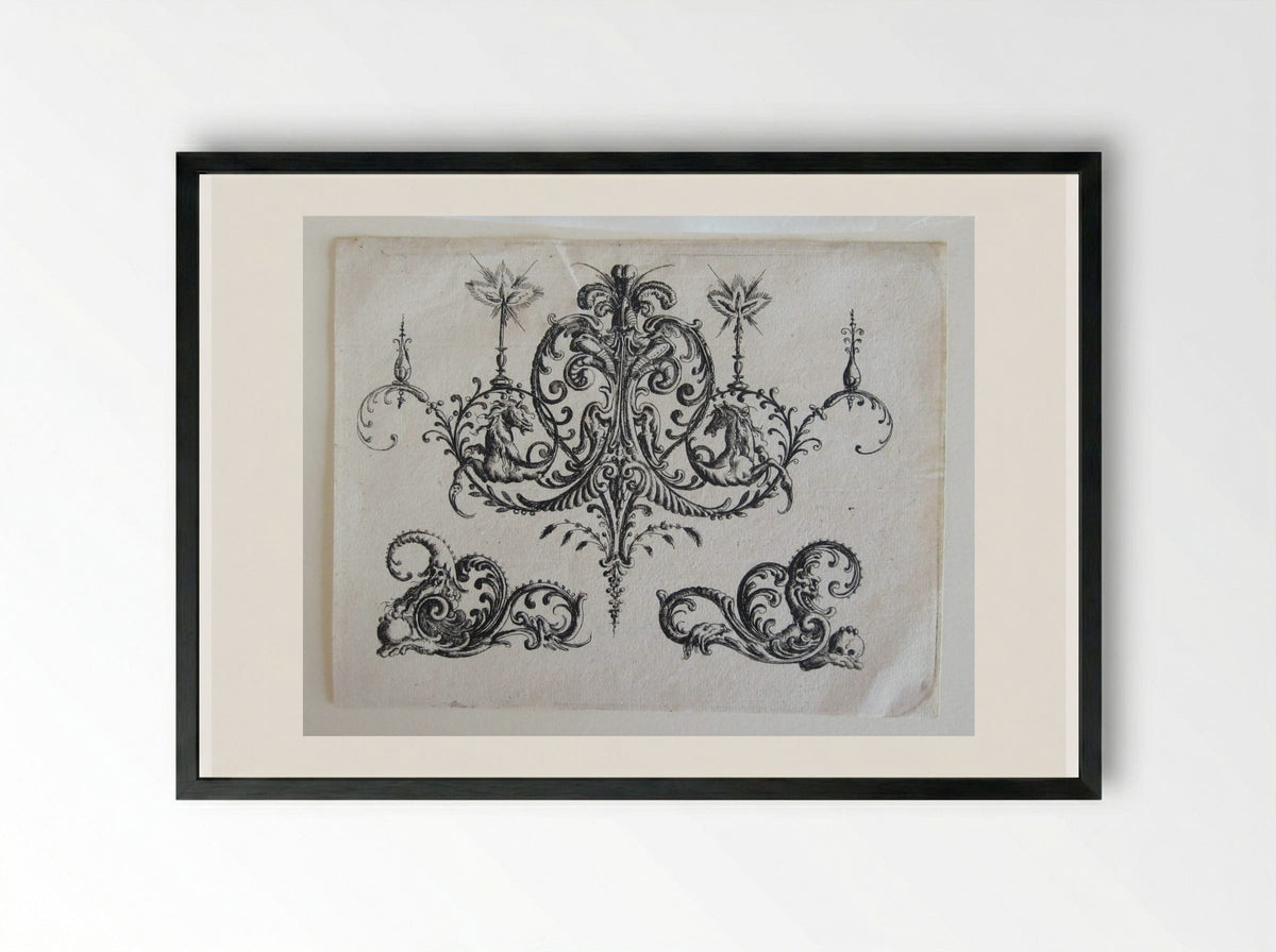 Tripartite Foliate Ornament, the Central Motif with a Helmet, Two Blazing Candles, and Tendrils Ending in Horses - Christoph Jamnitzer - Framed Print Black