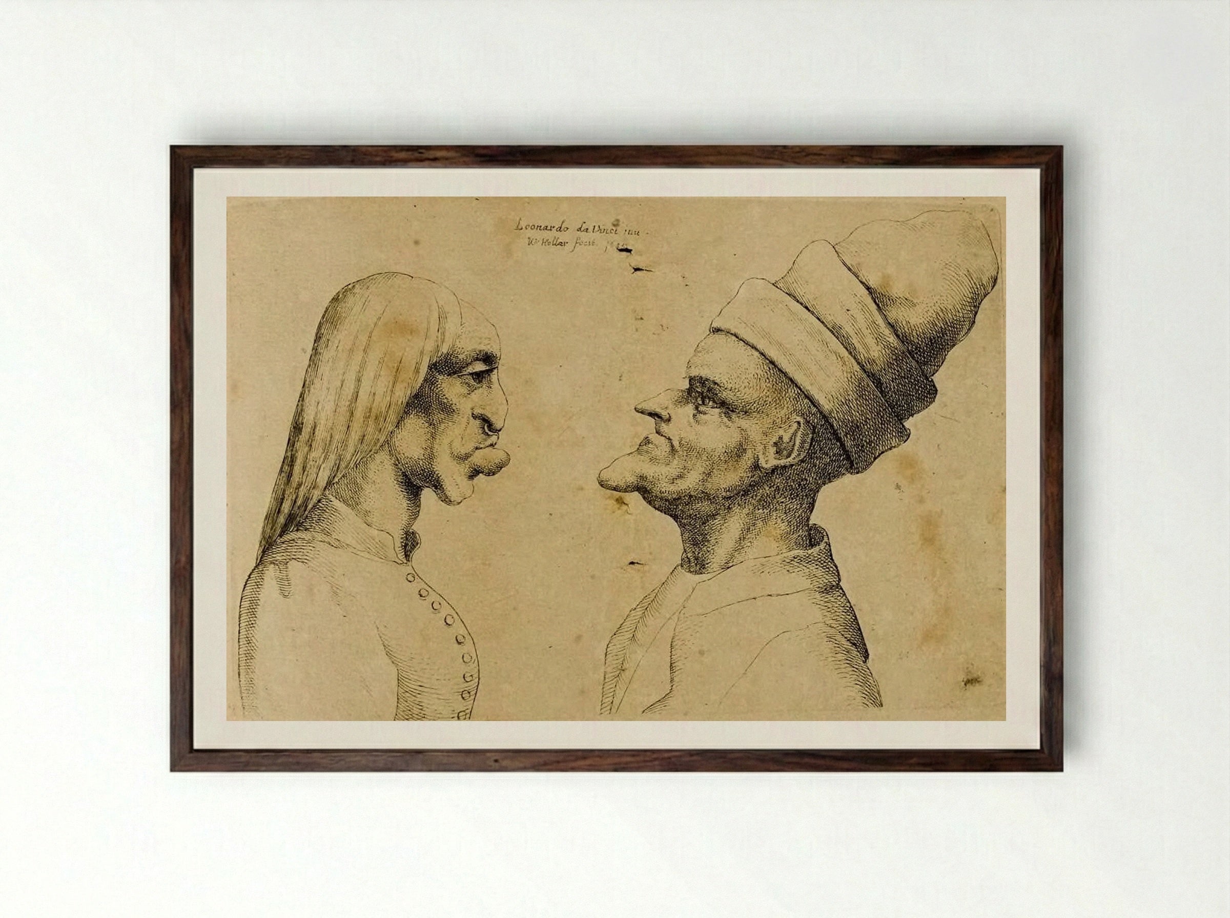 Two Deformed Heads Facing Each Other - Wenceslaus Hollar - Framed Print Dark Wood