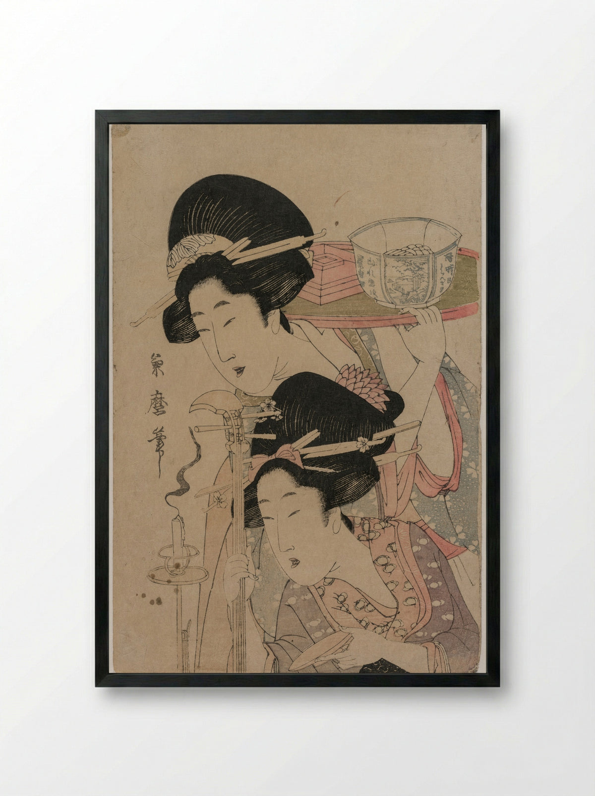 Two Geishas beside a Candle - Kitagawa Tsukimaro - Framed Print Black