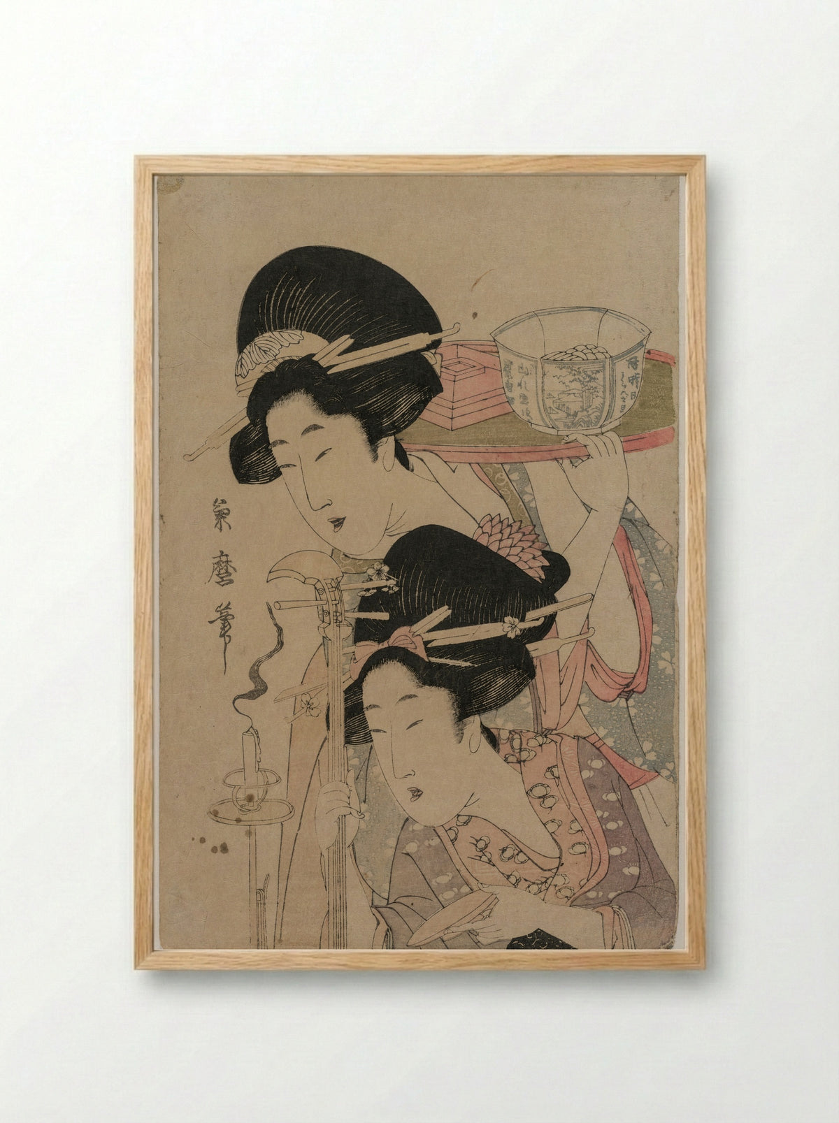 Two Geishas beside a Candle - Kitagawa Tsukimaro - Framed Print Wood