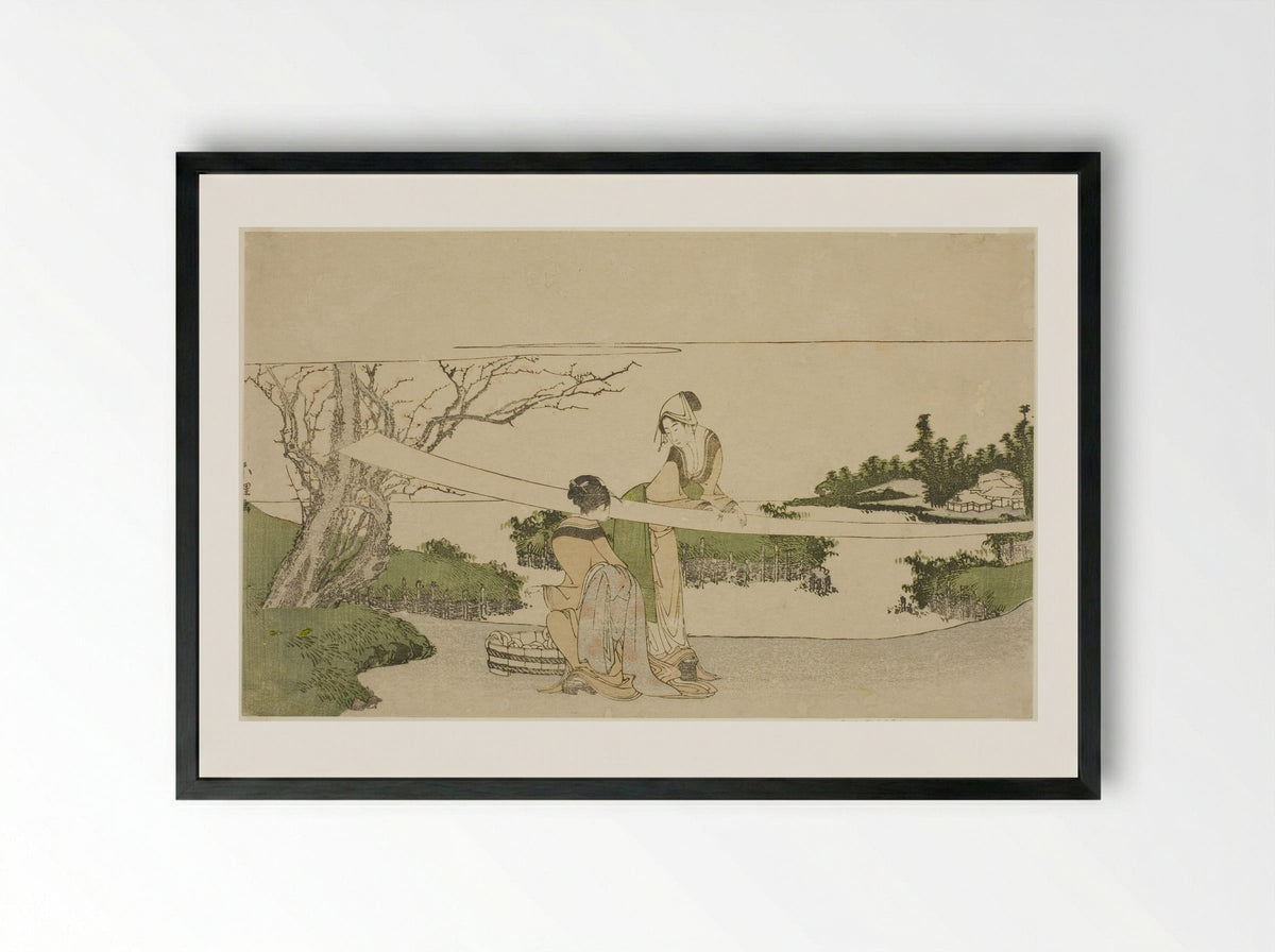 Two women stretching cloth - Katsushika Hokusai - Framed Print Black