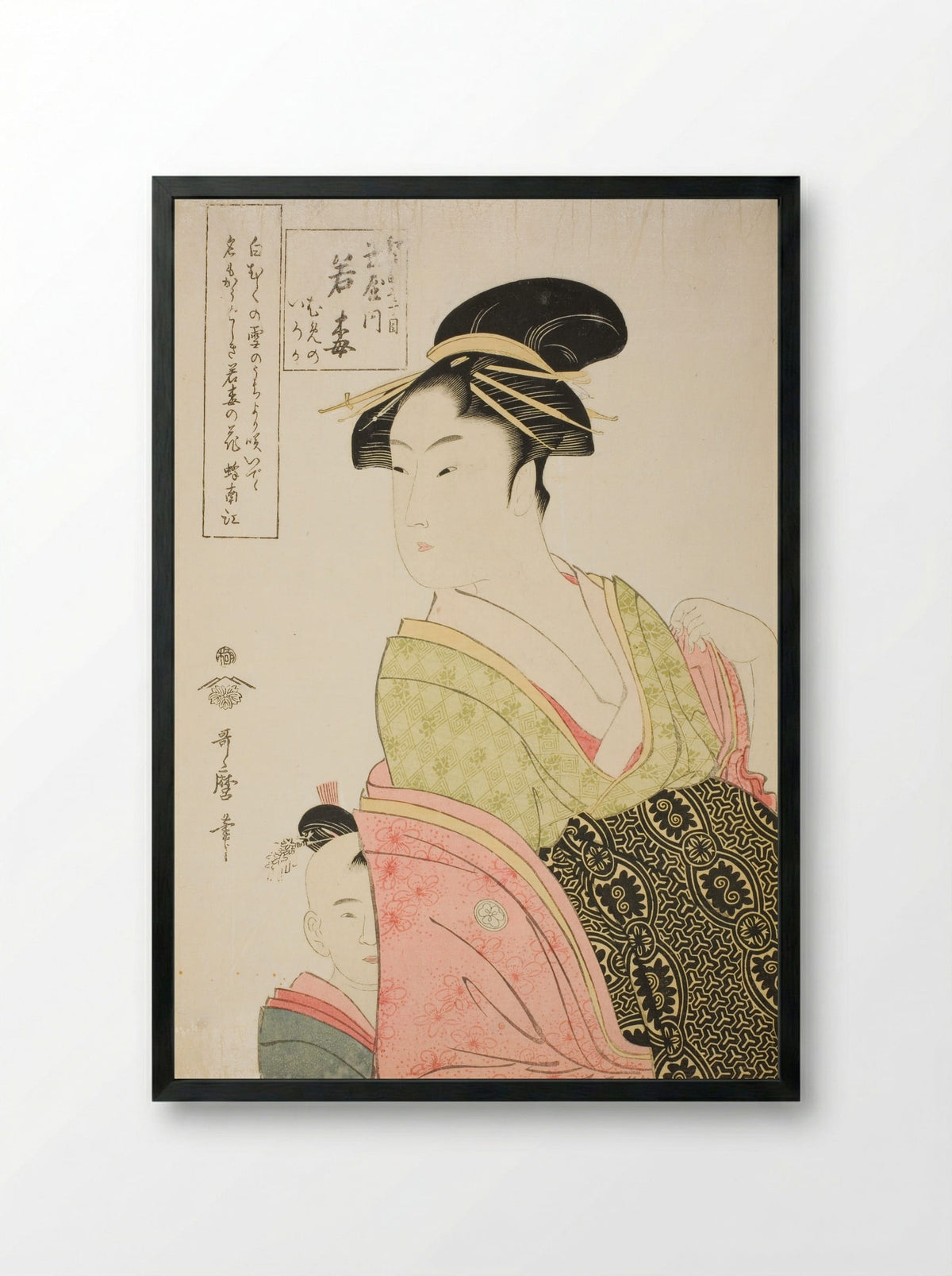 Wakaume of the Tamaya in Edo-cho itchome, and her child attendants Mumeno and Iroka - Kitagawa Utamaro - Framed Print Black