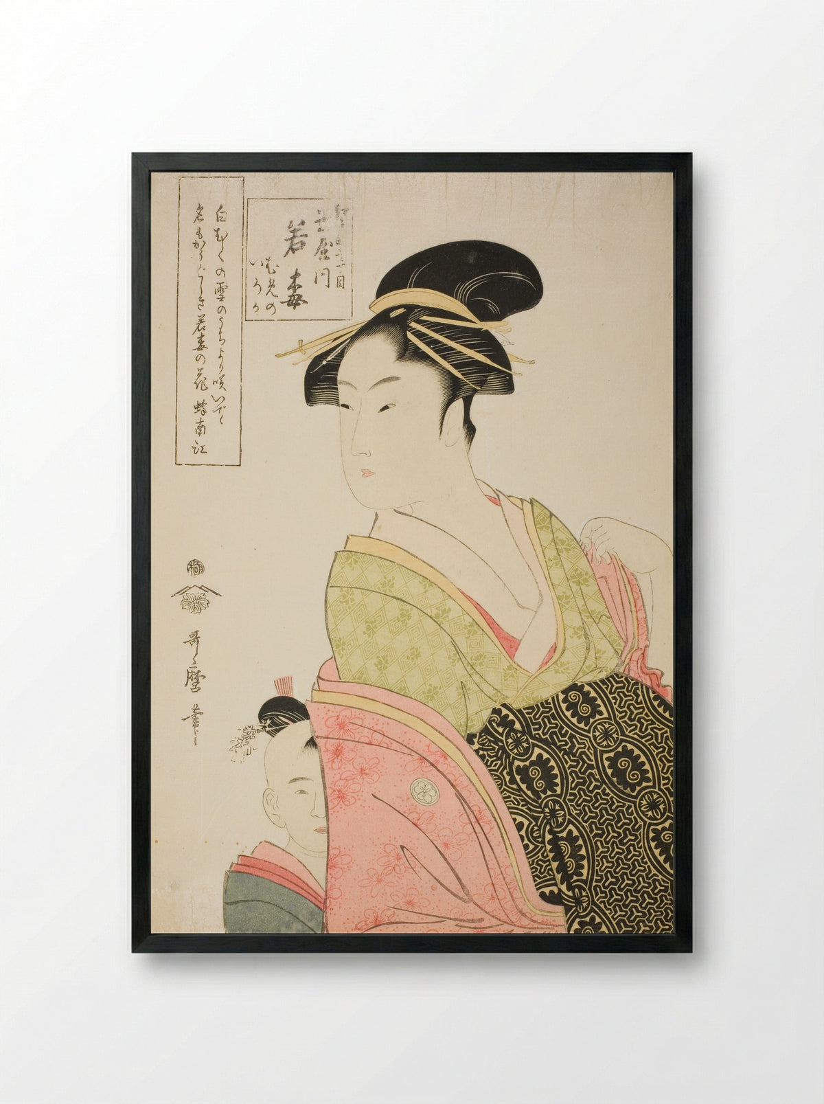 Wakaume of the Tamaya in Edo-cho itchome, and her child attendants Mumeno and Iroka - Kitagawa Utamaro - Framed Print Black