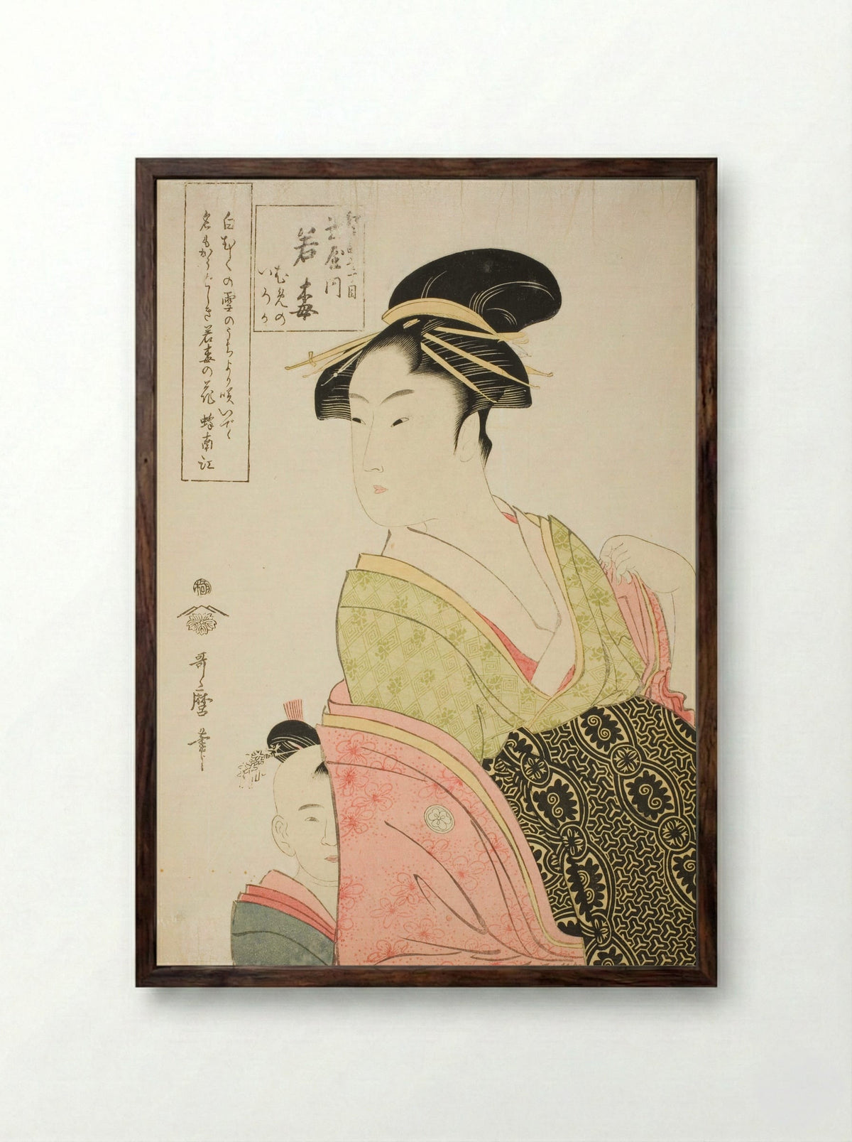 Wakaume of the Tamaya in Edo-cho itchome, and her child attendants Mumeno and Iroka - Kitagawa Utamaro - Framed Print Dark Wood