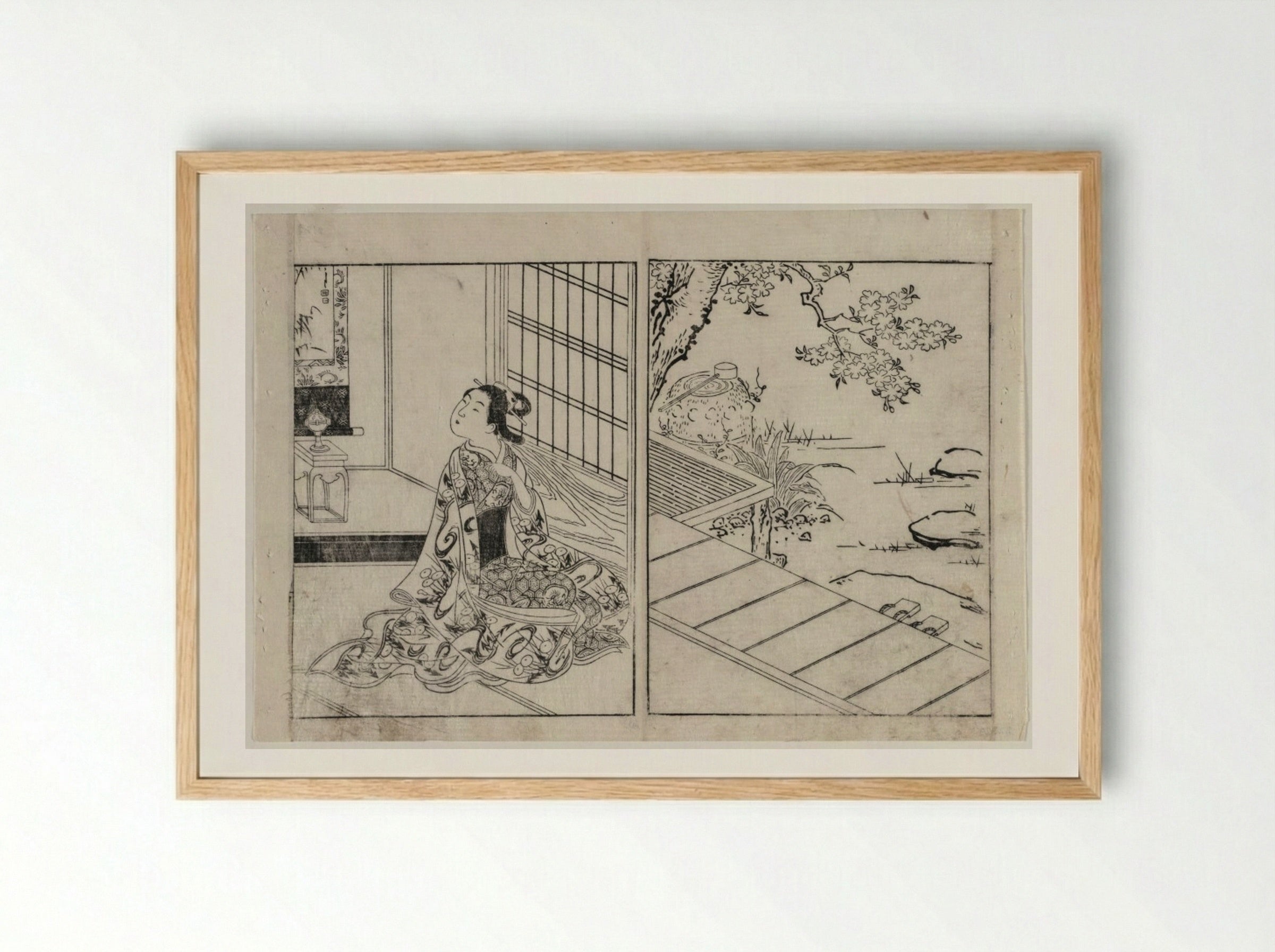 Woman Looking at a Hanging Scroll - Nishikawa Sukenobu - Framed Print Wood