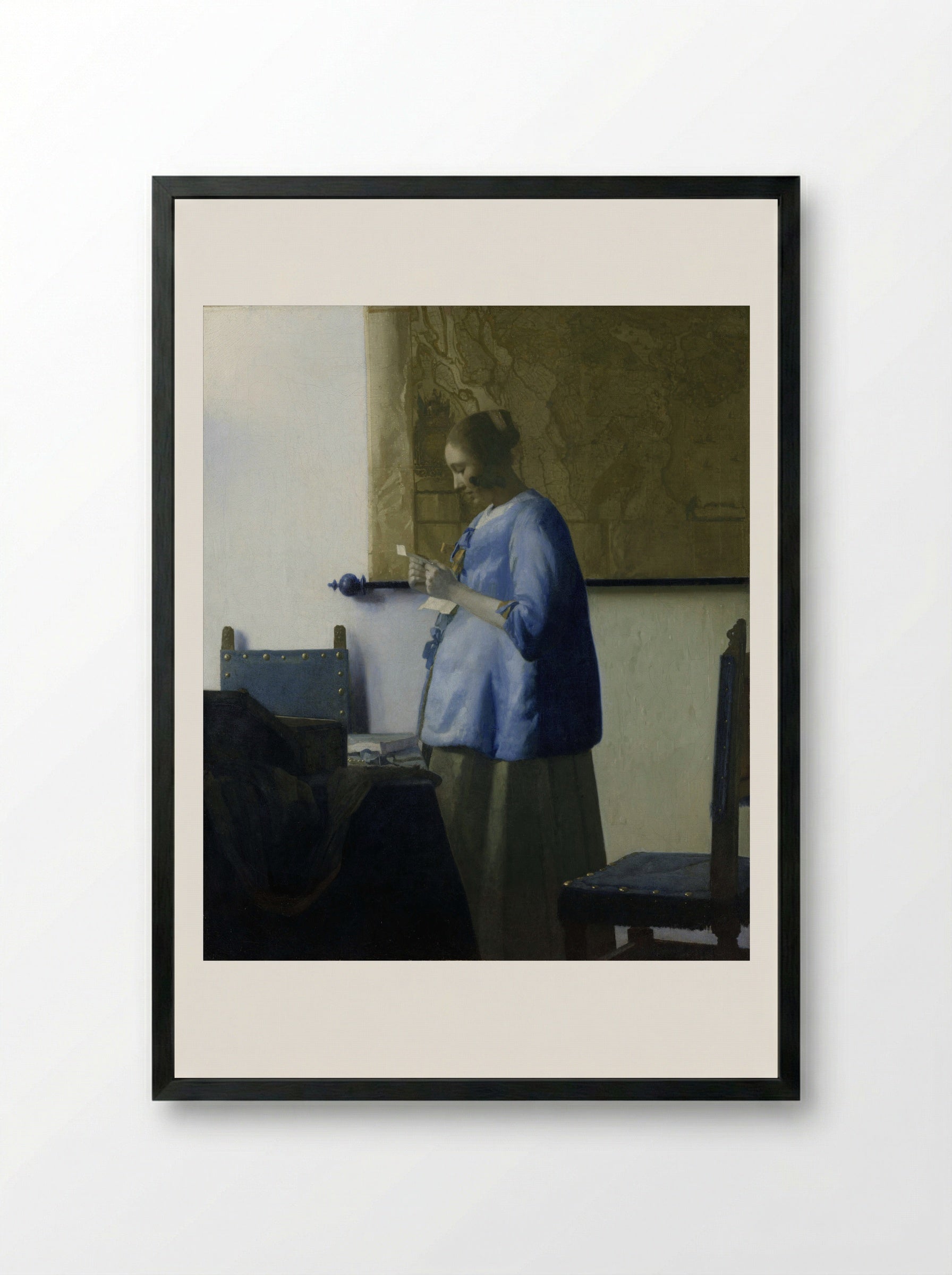 Woman in Blue Reading a Letter - Johannes Vermeer - Framed Print Black