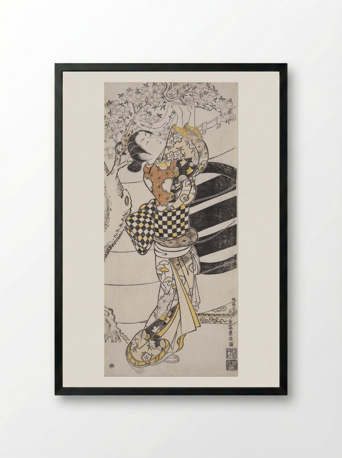 Young Woman Reading Tanzaku Tied to a Cherry Tree - Ishikawa Toyonobu - Framed Print Black