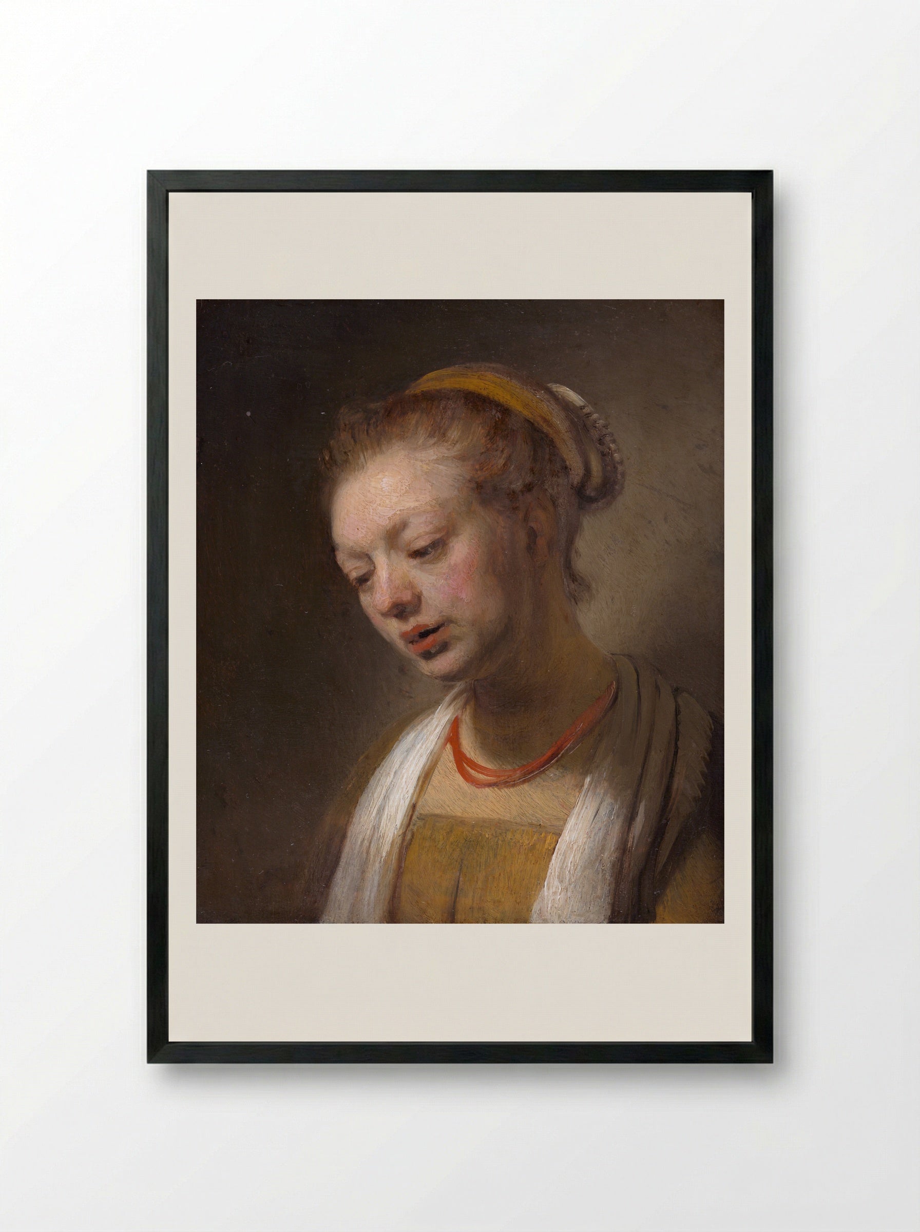 Young Woman with a Red Necklace - Rembrandt van Rijn - Framed Print Black