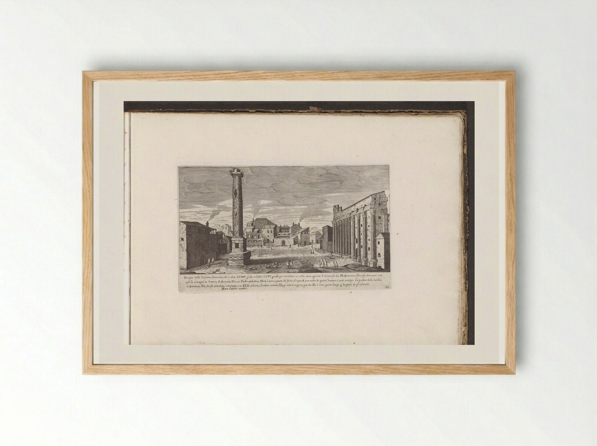 Zuil van Marcus Aurelius met rechts de Tempel van Hadrianus - Giovanni Giacomo de' Rossi - Framed Print Wood